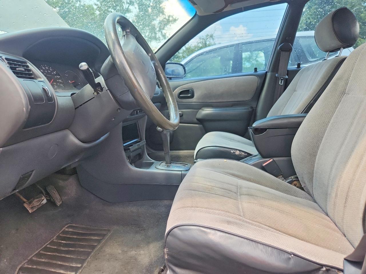 1997 Toyota Corolla Base Серый vin: 2T1BA02EXVC185072