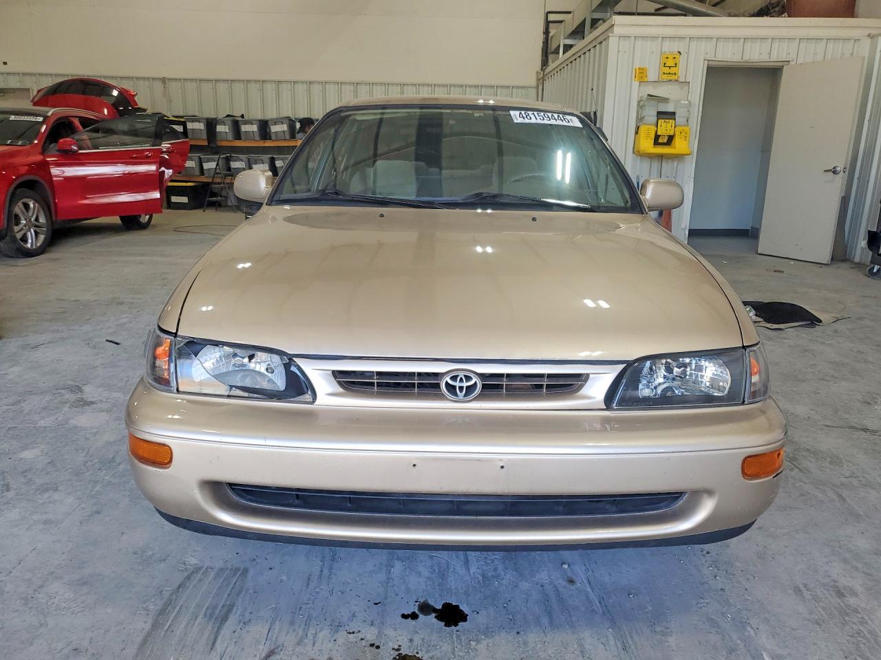 1996 Toyota Corolla Dx Tan vin: 2T1BB02E5TC170330