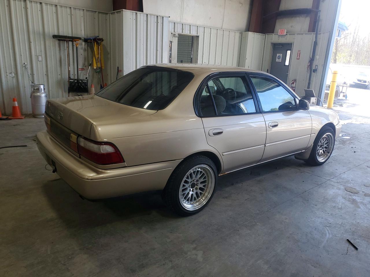 1996 Toyota Corolla Dx Tan vin: 2T1BB02E5TC170330