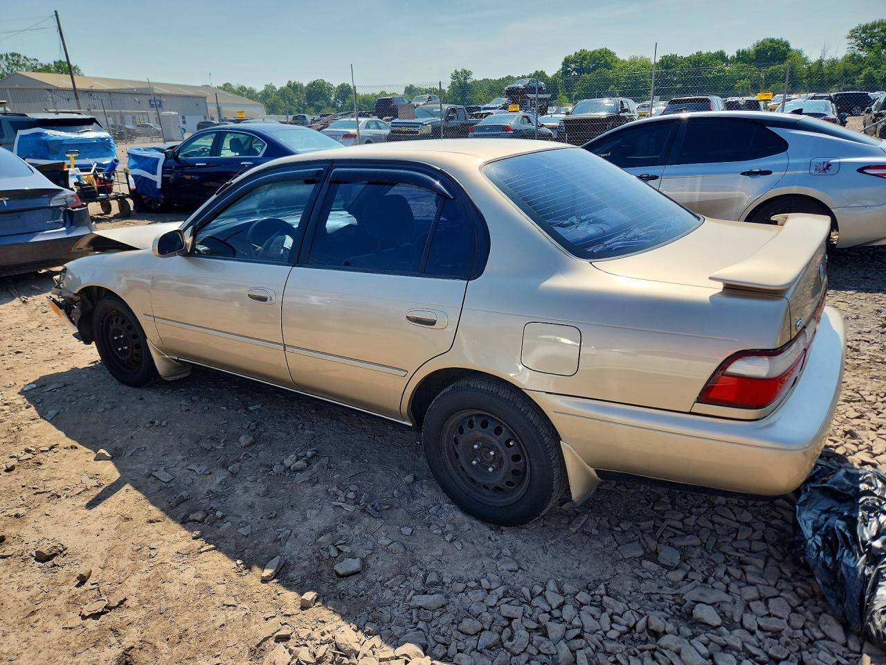 1997 Toyota Corolla Dx Tan vin: 2T1BB02E7VC193935