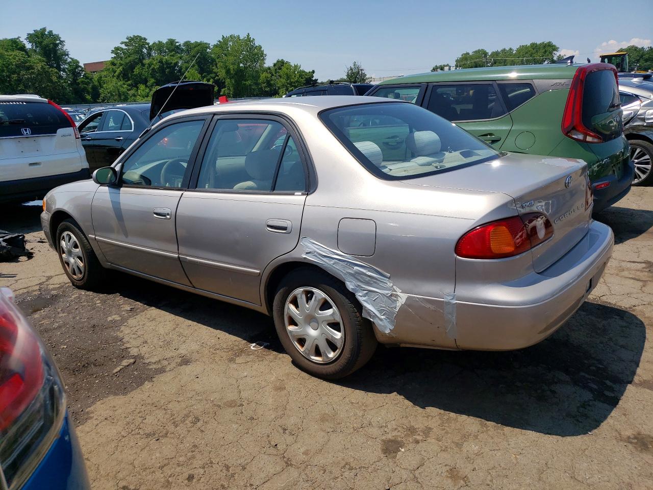 2001 Toyota Corolla Le Beige vin: 2T1BR12E01C416599