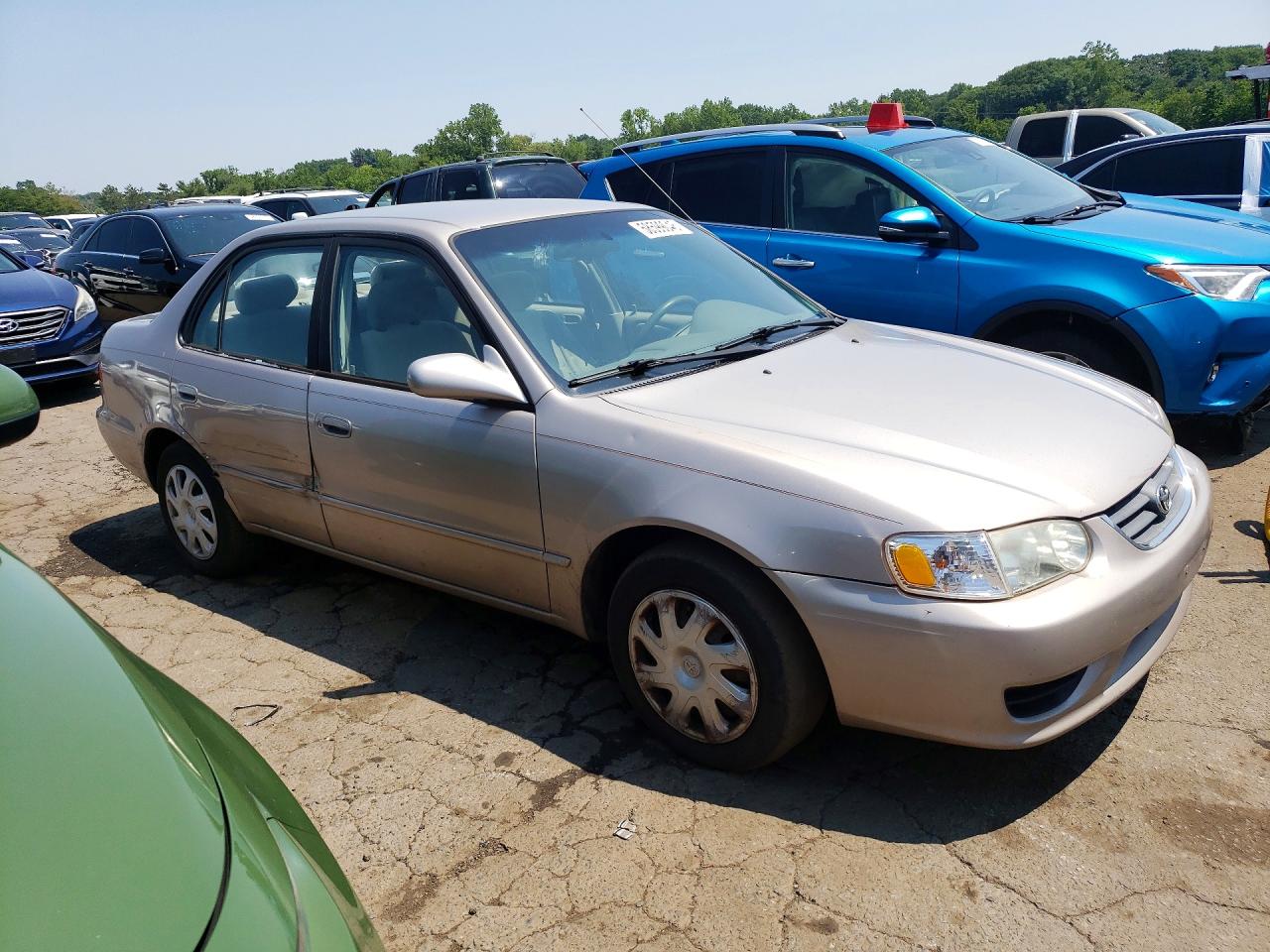 2001 Toyota Corolla Le Beige vin: 2T1BR12E01C416599