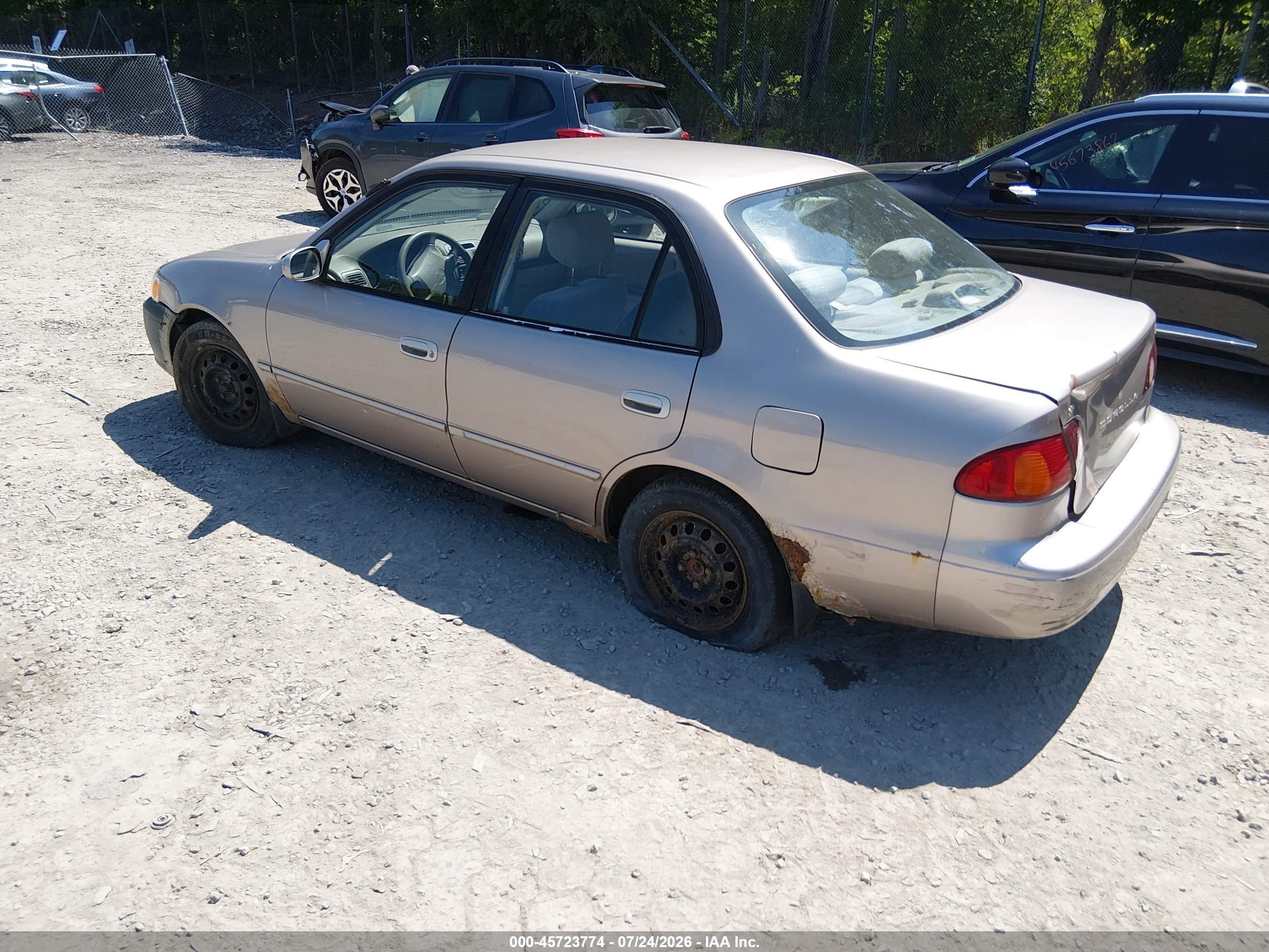 2002 Toyota Corolla Le Champagne vin: 2T1BR12E02C527042