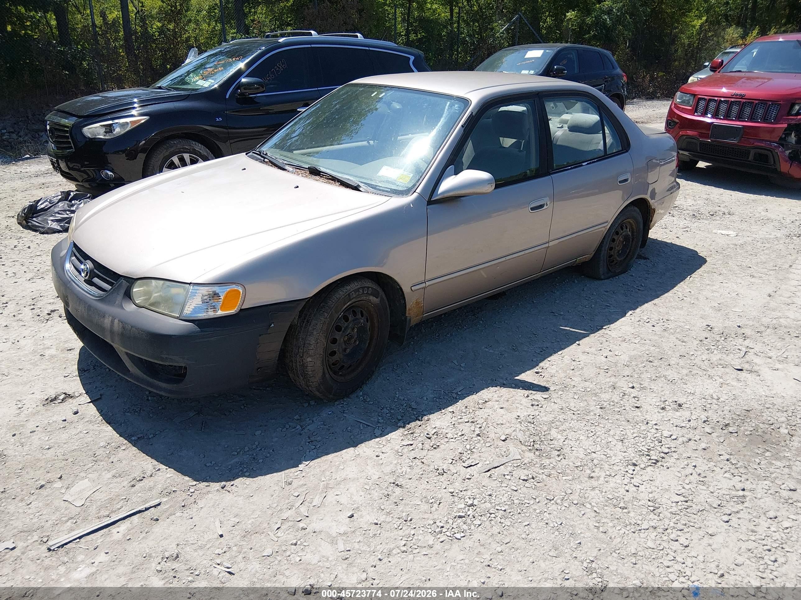 2002 Toyota Corolla Le Champagne vin: 2T1BR12E02C527042