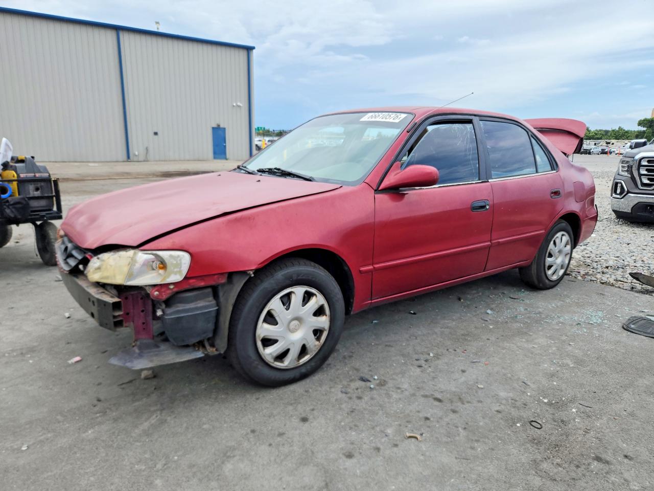 2002 Toyota Corolla Le Red vin: 2T1BR12E02C562020