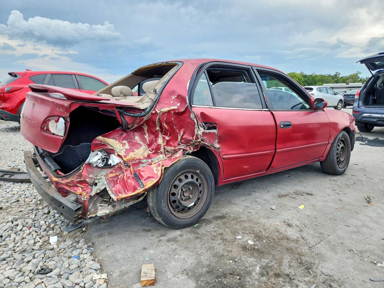 2002 Toyota Corolla Le Red vin: 2T1BR12E02C562020