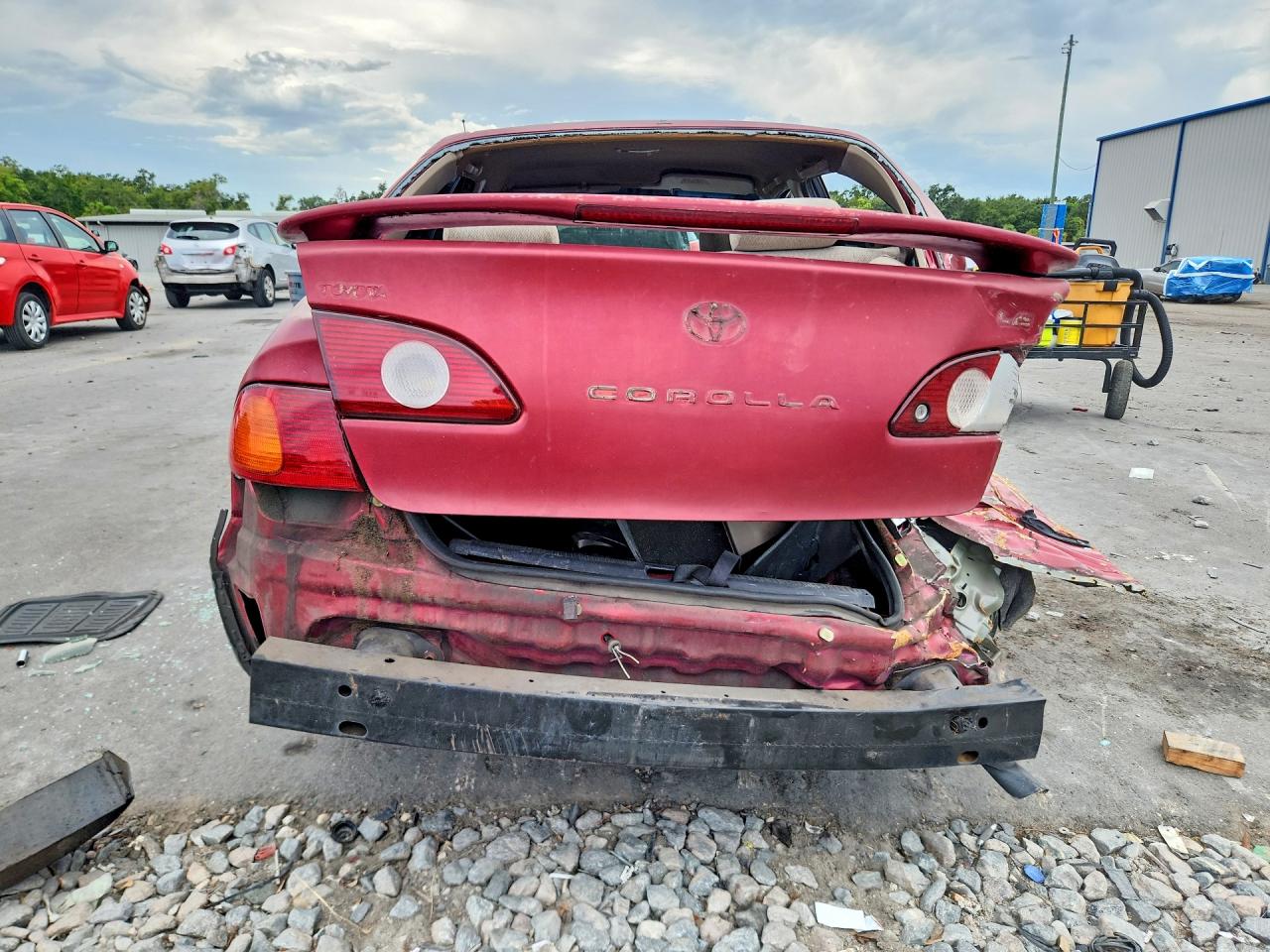 2002 Toyota Corolla Le Red vin: 2T1BR12E02C562020