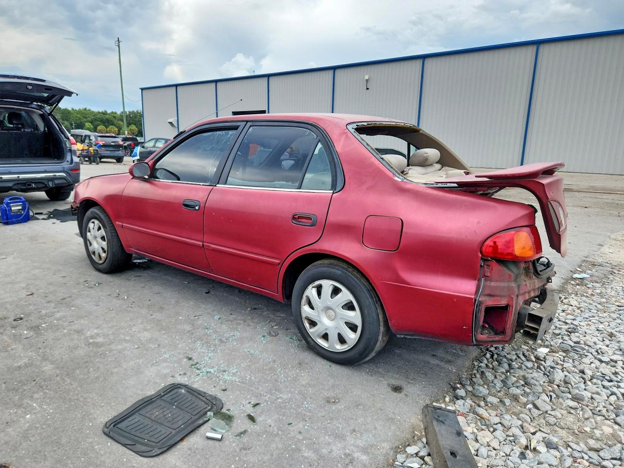 2002 Toyota Corolla Le Red vin: 2T1BR12E02C562020
