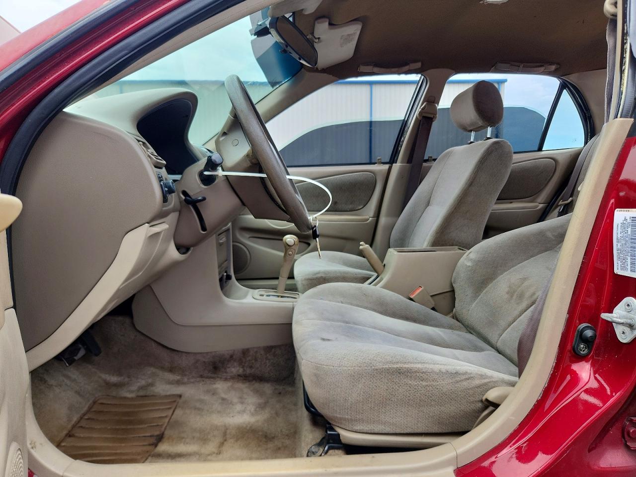 2002 Toyota Corolla Le Red vin: 2T1BR12E02C562020