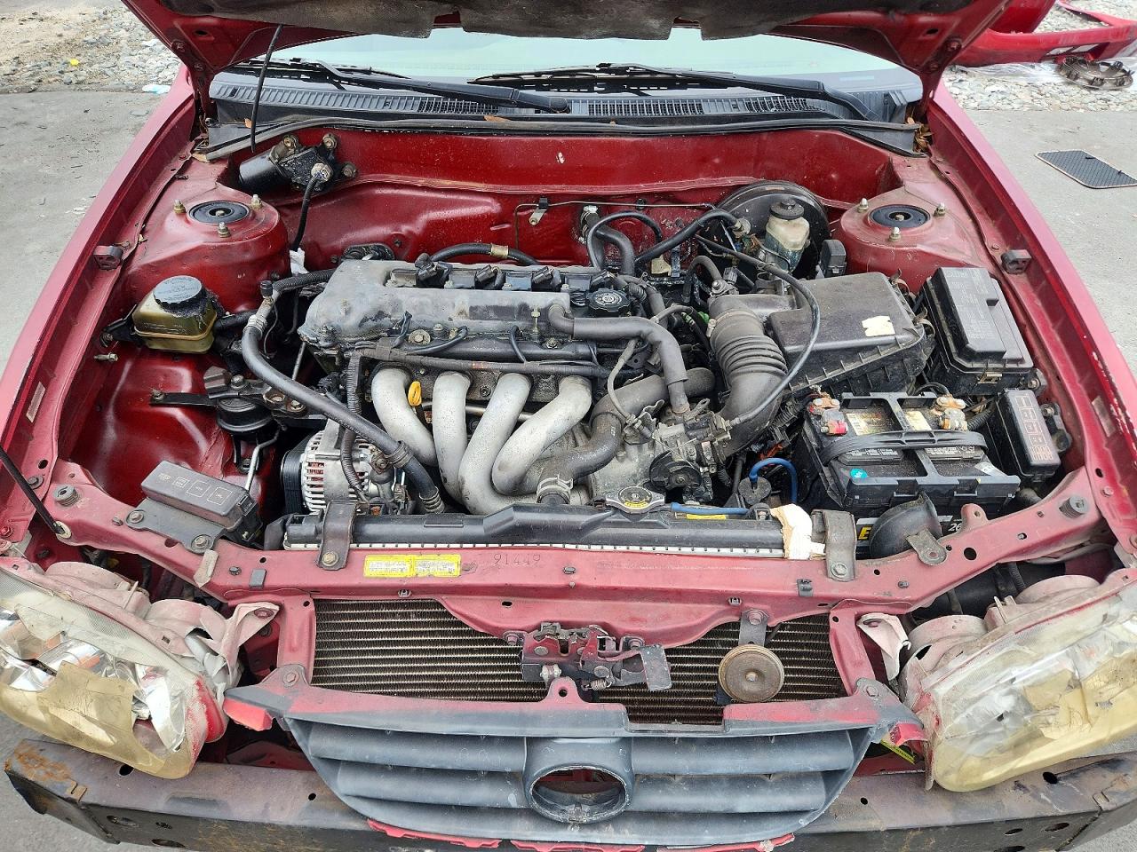 2002 Toyota Corolla Le Red vin: 2T1BR12E02C562020