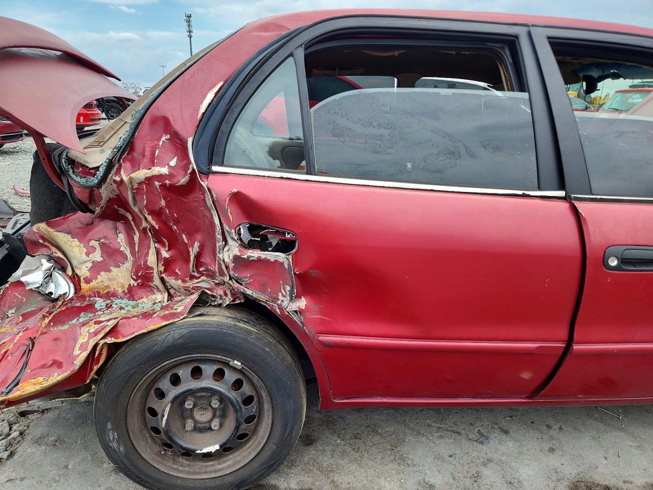 2002 Toyota Corolla Le Red vin: 2T1BR12E02C562020