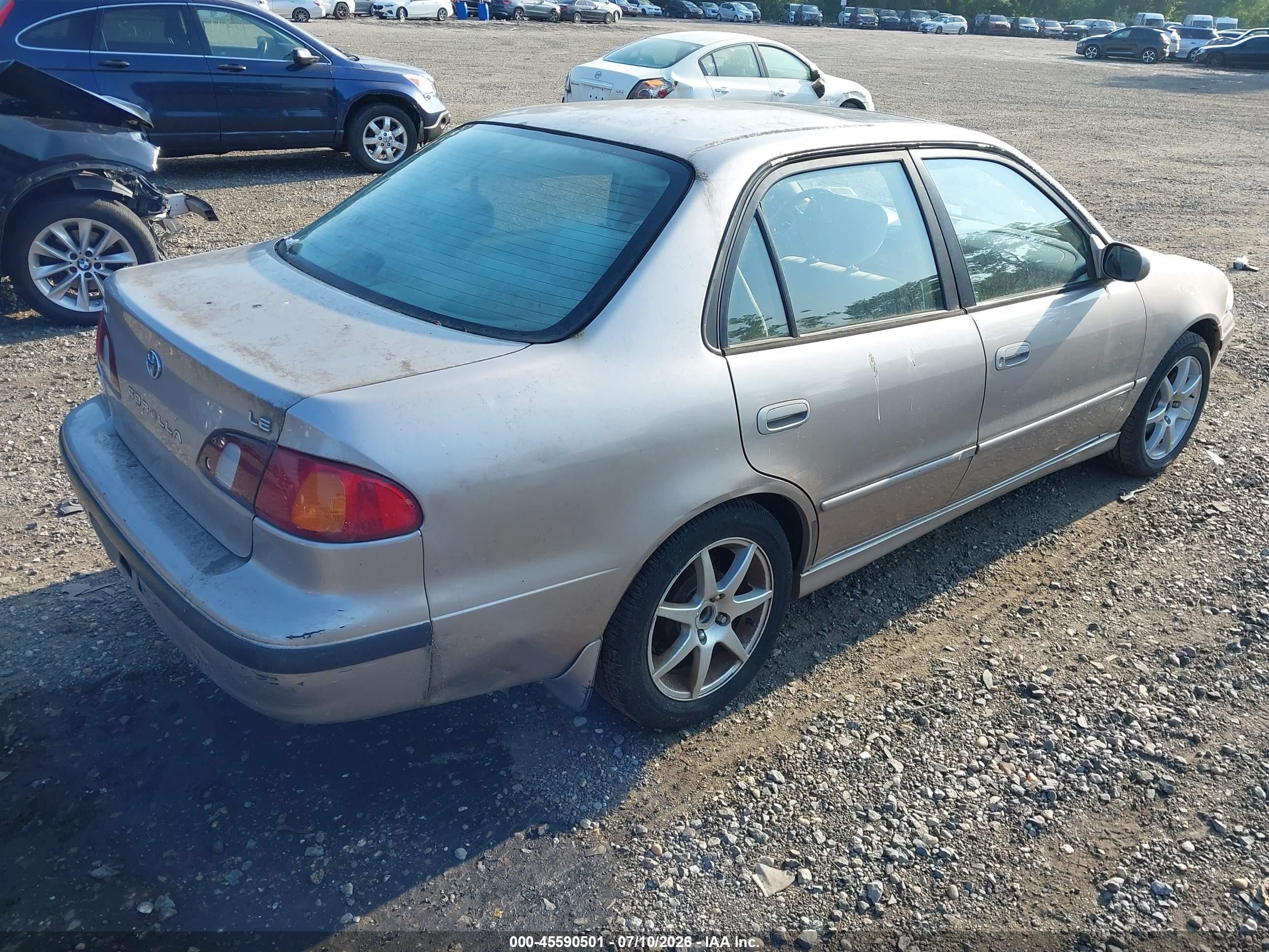 1999 Toyota Corolla Le Желто-коричневый vin: 2T1BR12E0XC110401