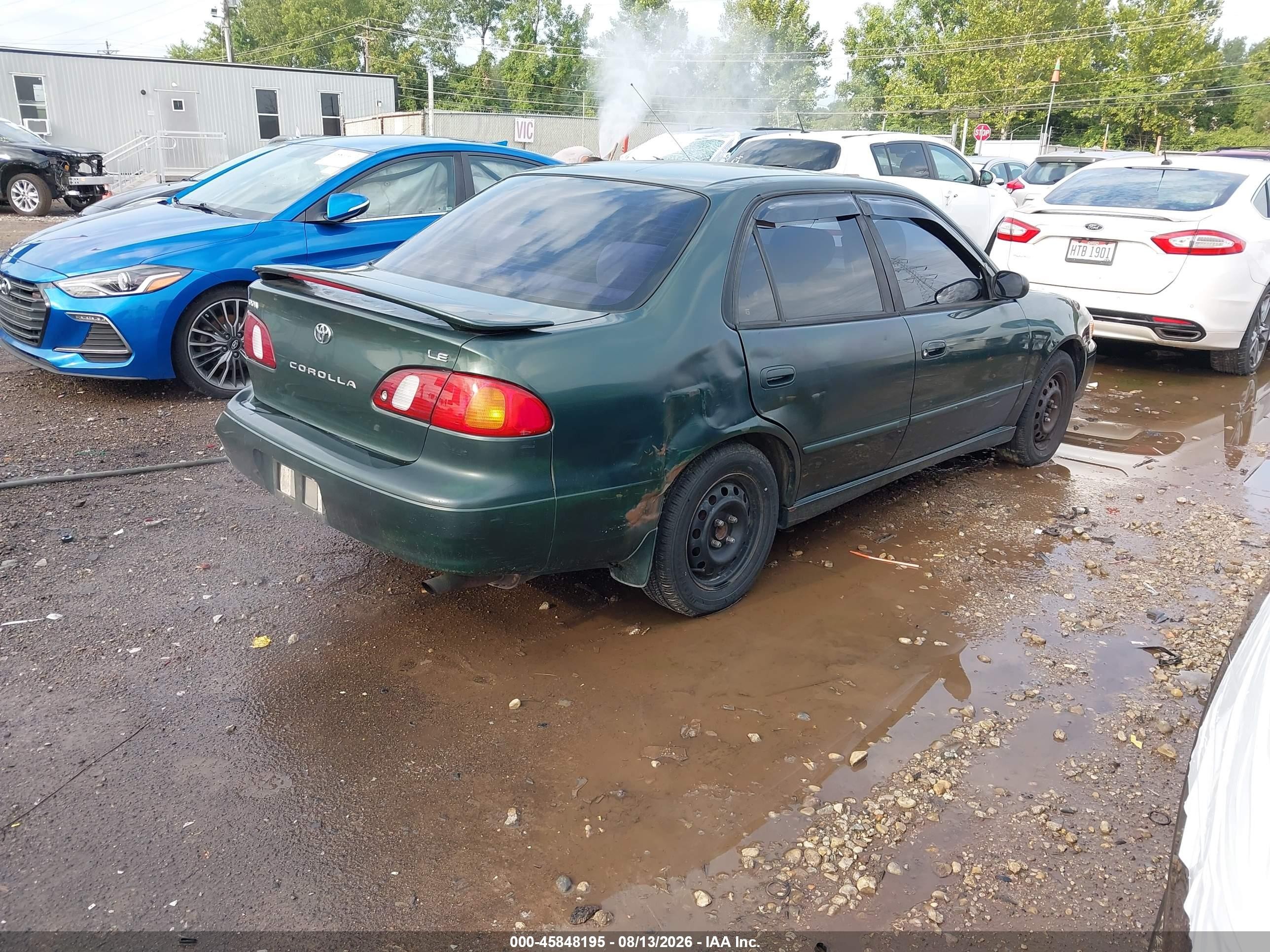 2000 Toyota Corolla Le Green vin: 2T1BR12E0YC340795