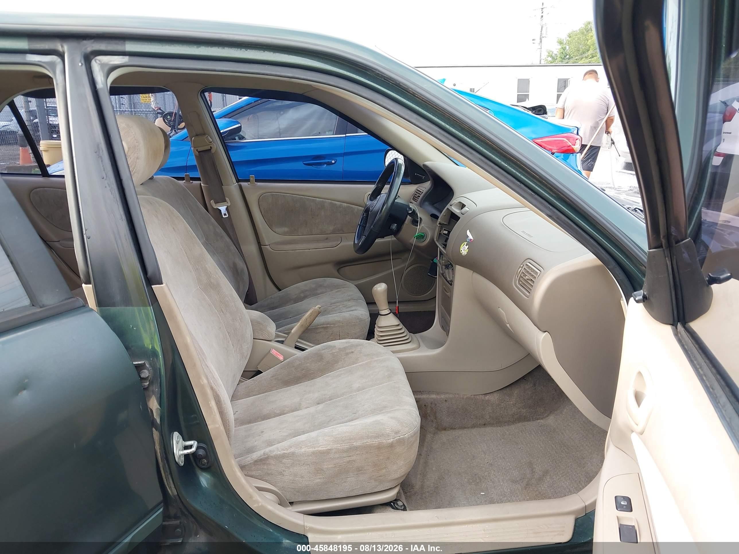 2000 Toyota Corolla Le Green vin: 2T1BR12E0YC340795