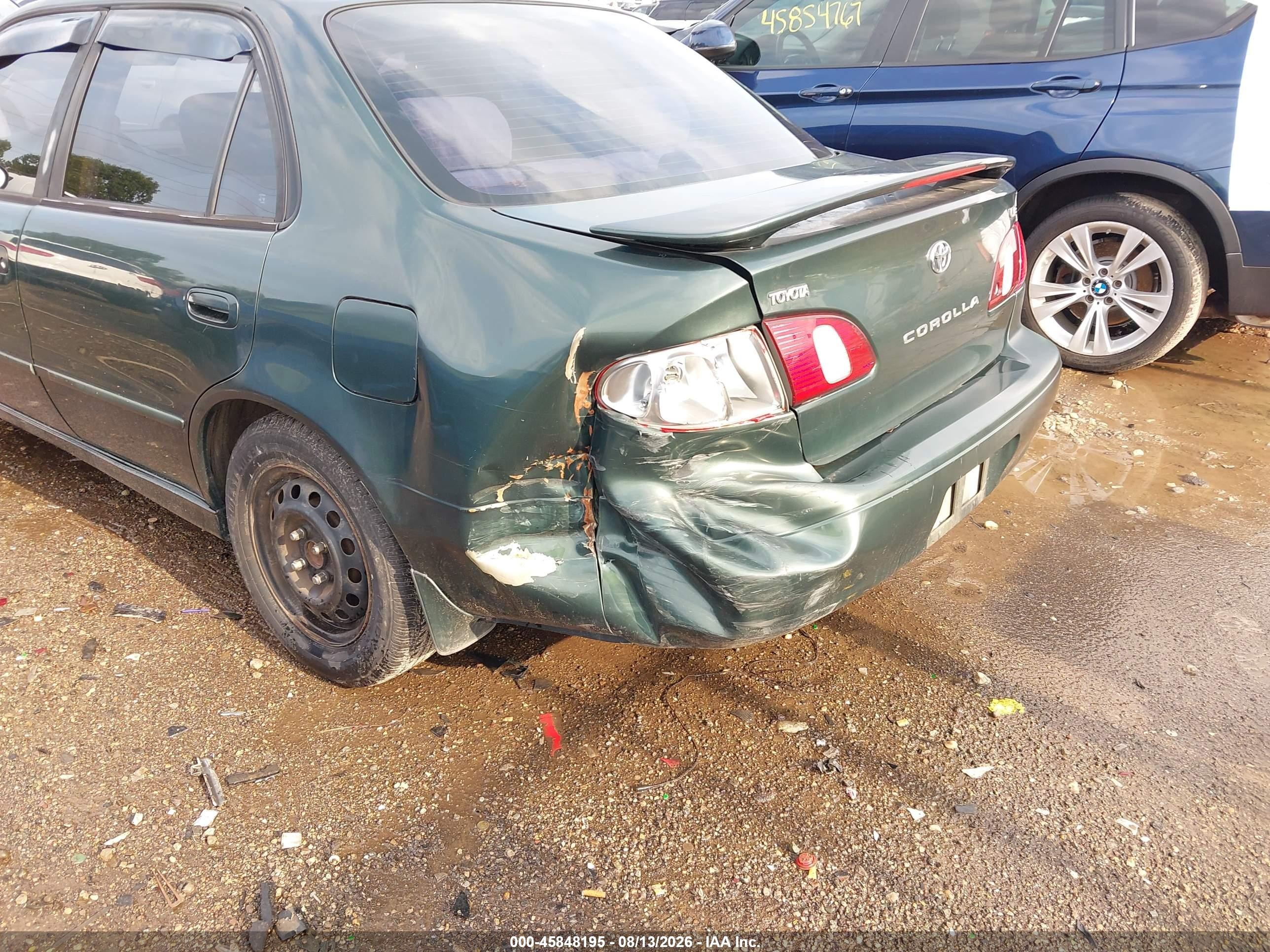 2000 Toyota Corolla Le Green vin: 2T1BR12E0YC340795