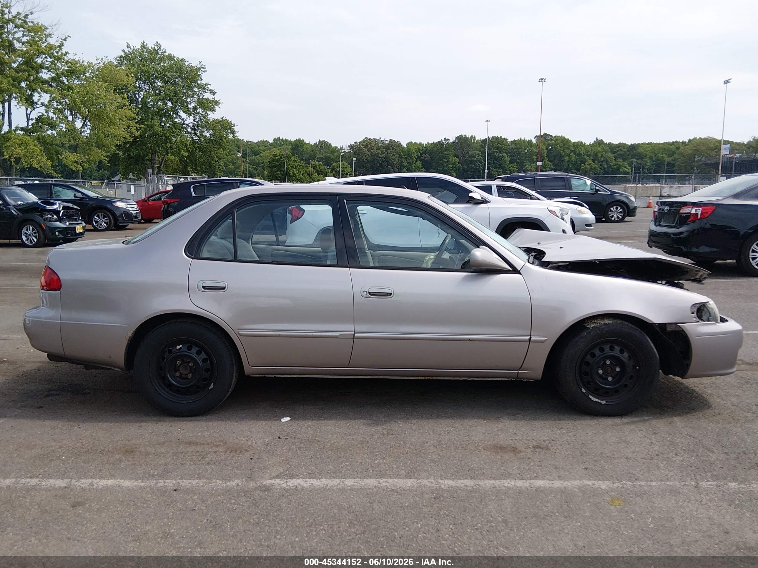 2001 Toyota Corolla Le Tan vin: 2T1BR12E11C442144