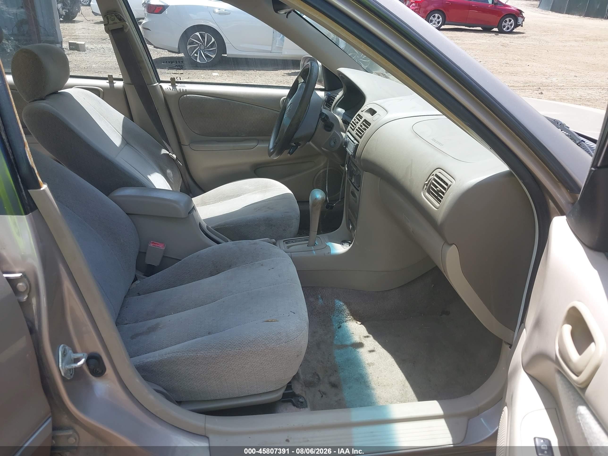 2001 Toyota Corolla Le Beige vin: 2T1BR12E11C506750