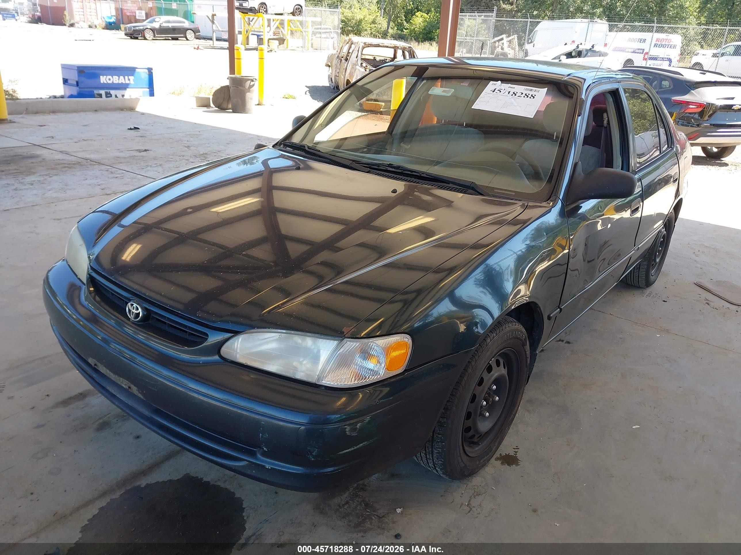1999 Toyota Corolla Le Green vin: 2T1BR12E2XC115924