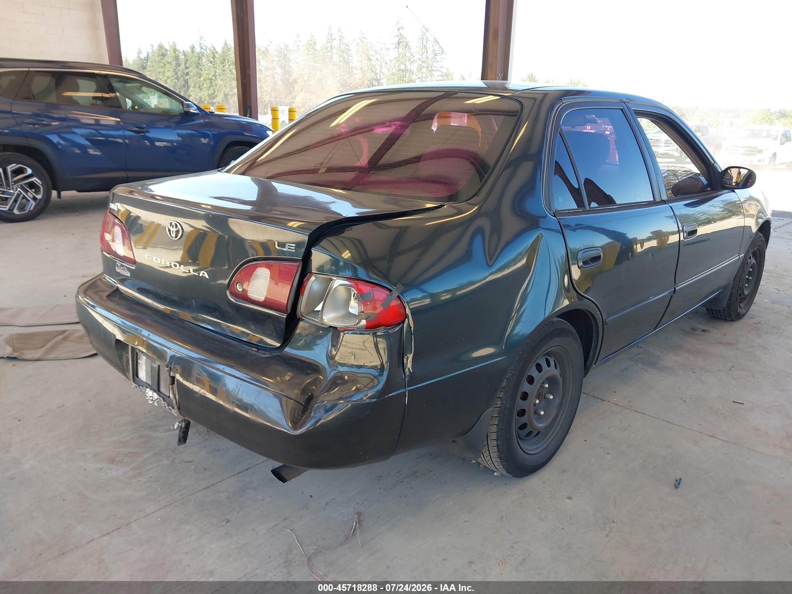 1999 Toyota Corolla Le Green vin: 2T1BR12E2XC115924