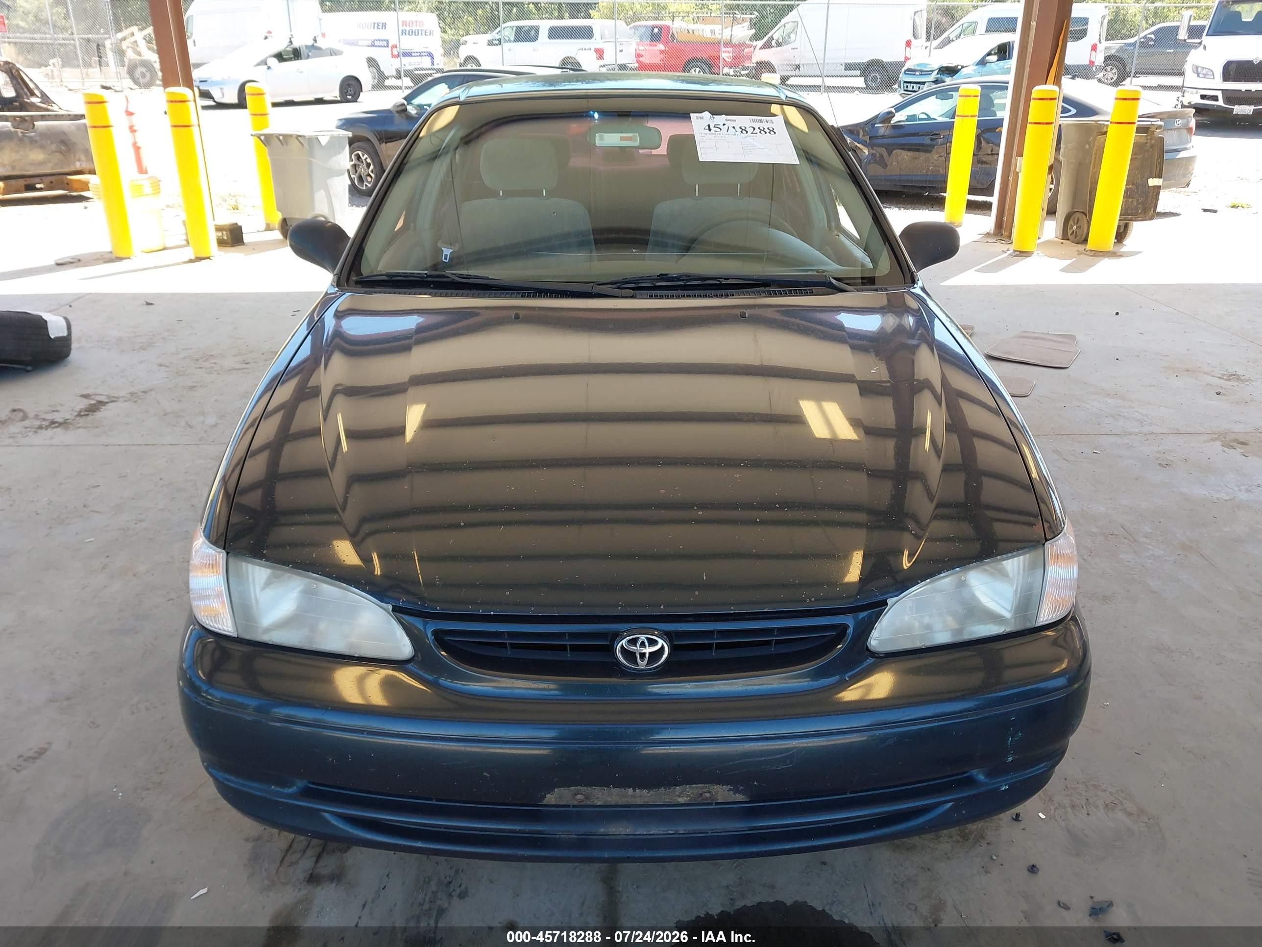 1999 Toyota Corolla Le Green vin: 2T1BR12E2XC115924