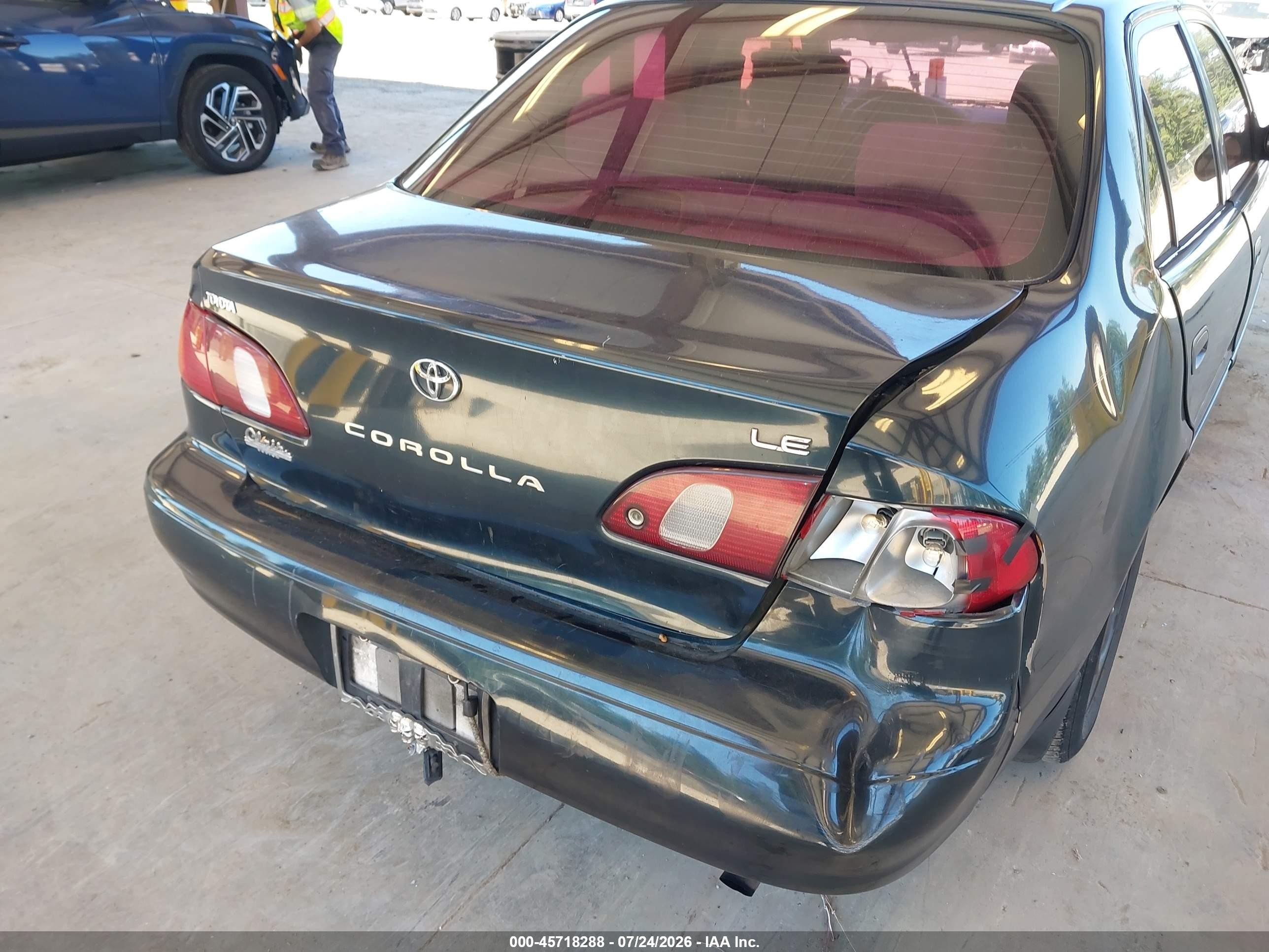 1999 Toyota Corolla Le Green vin: 2T1BR12E2XC115924