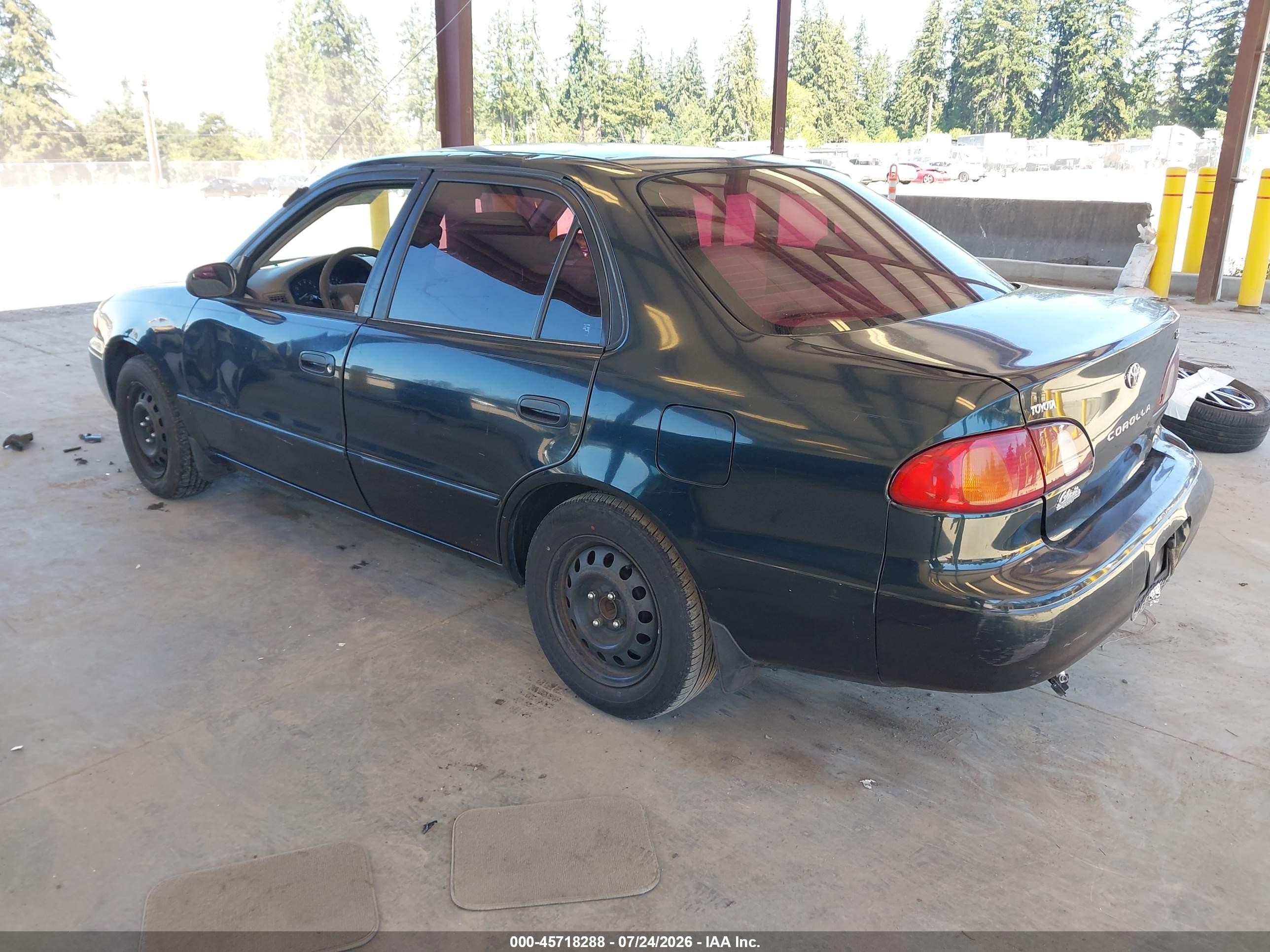 1999 Toyota Corolla Le Green vin: 2T1BR12E2XC115924