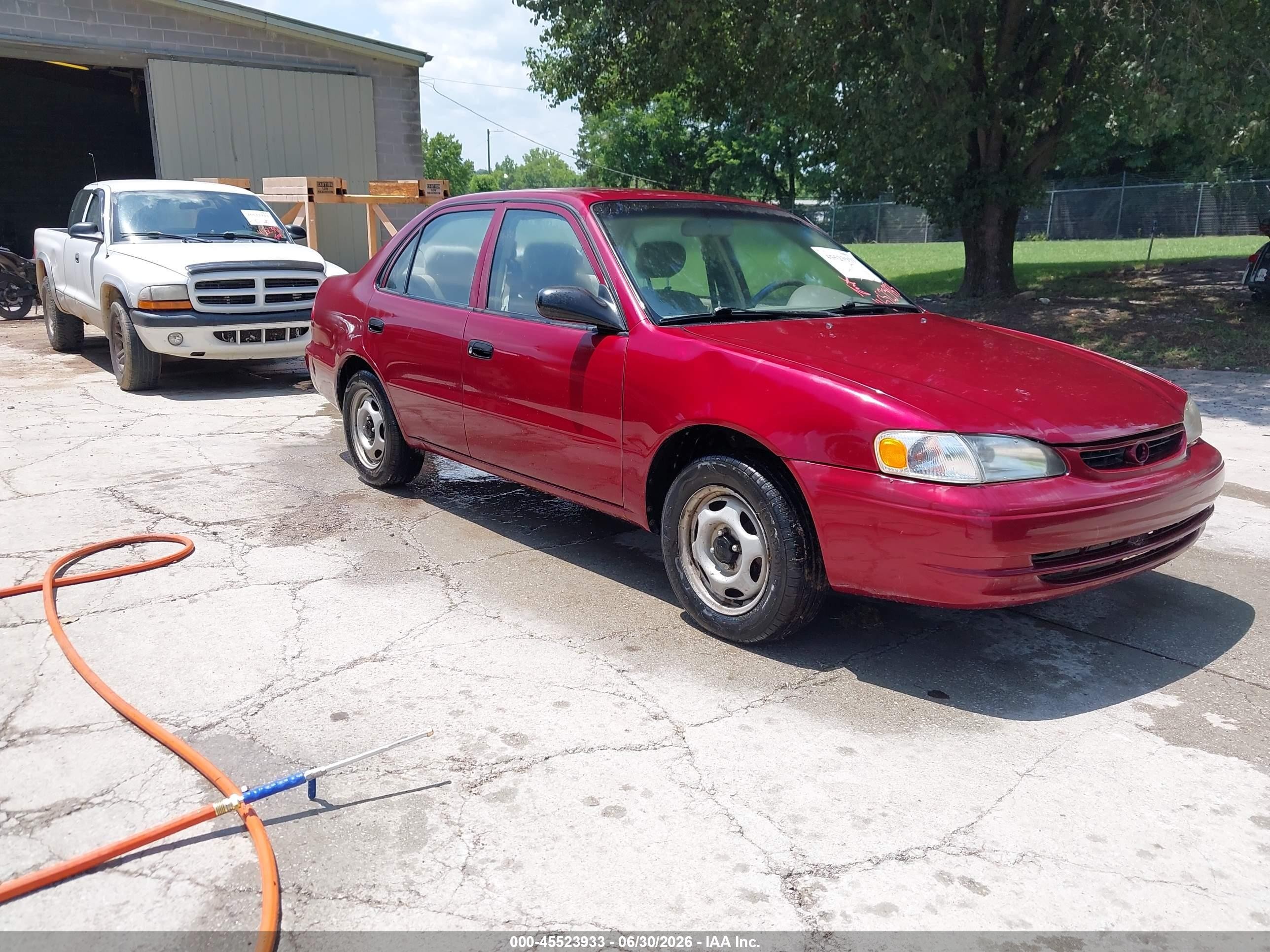 1999 Toyota Corolla Ve Red vin: 2T1BR12E2XC120038