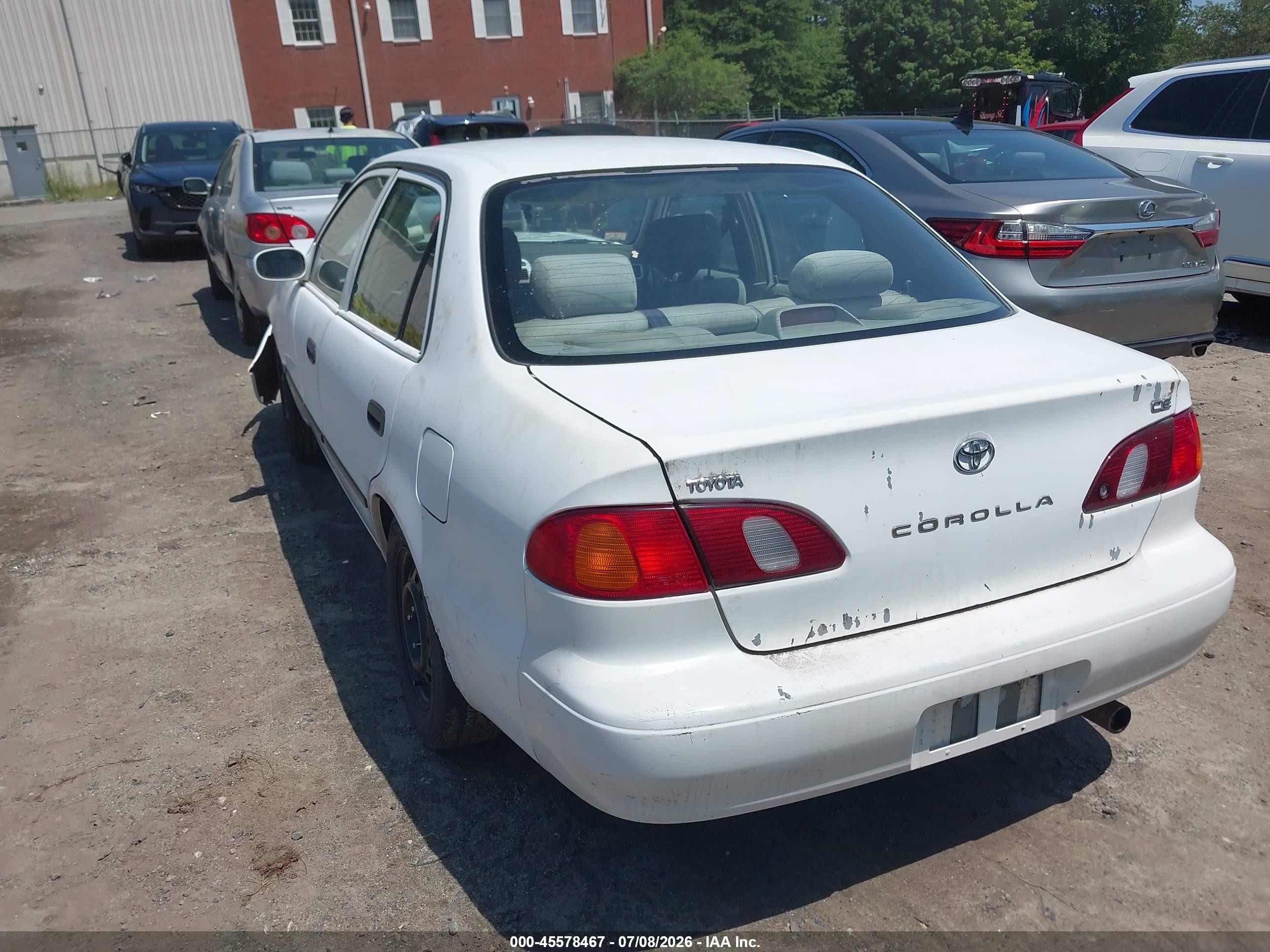 1999 Toyota Corolla Ce White vin: 2T1BR12E2XC129709
