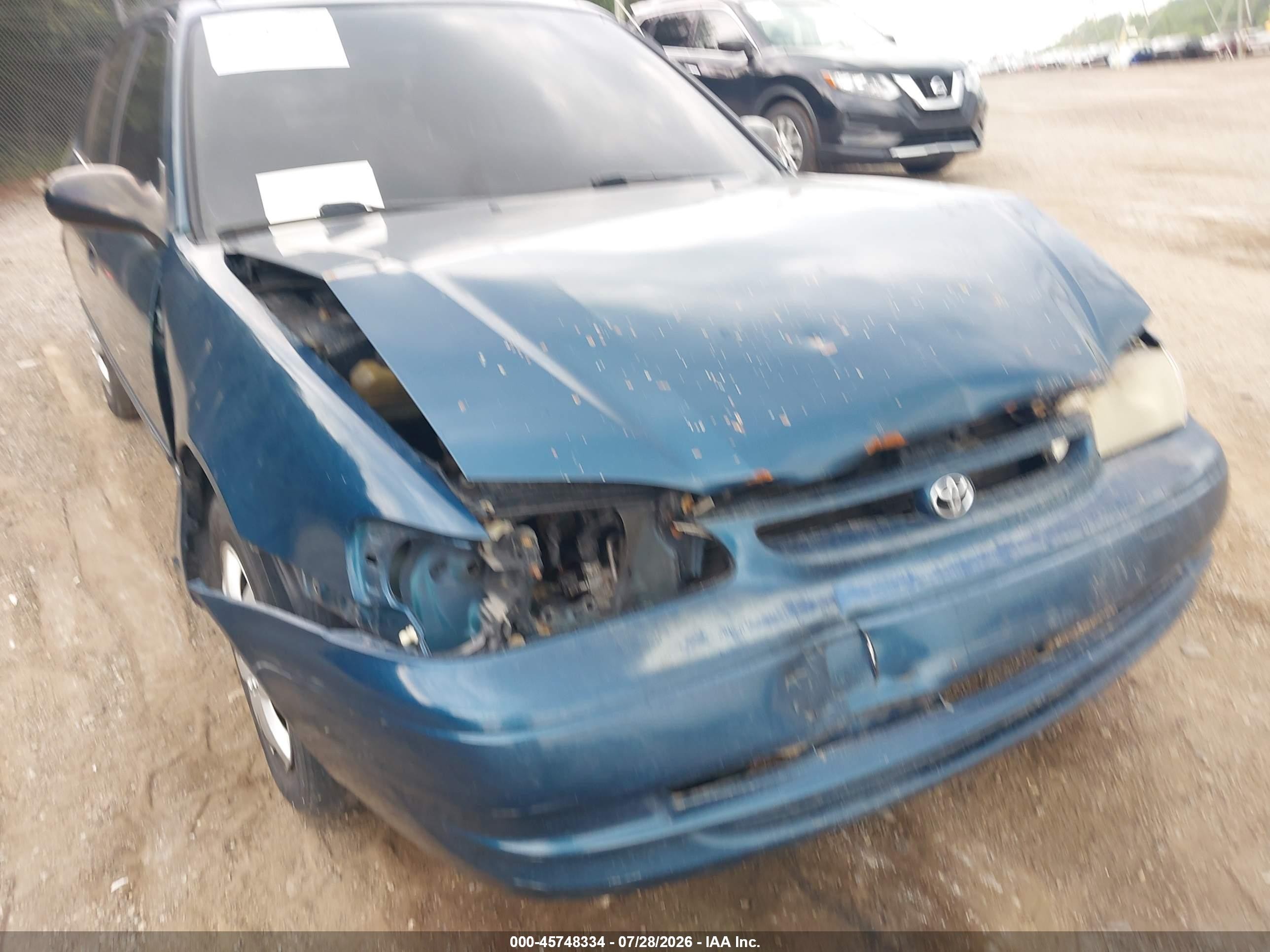 1999 Toyota Corolla Ce Blue vin: 2T1BR12E2XC186816