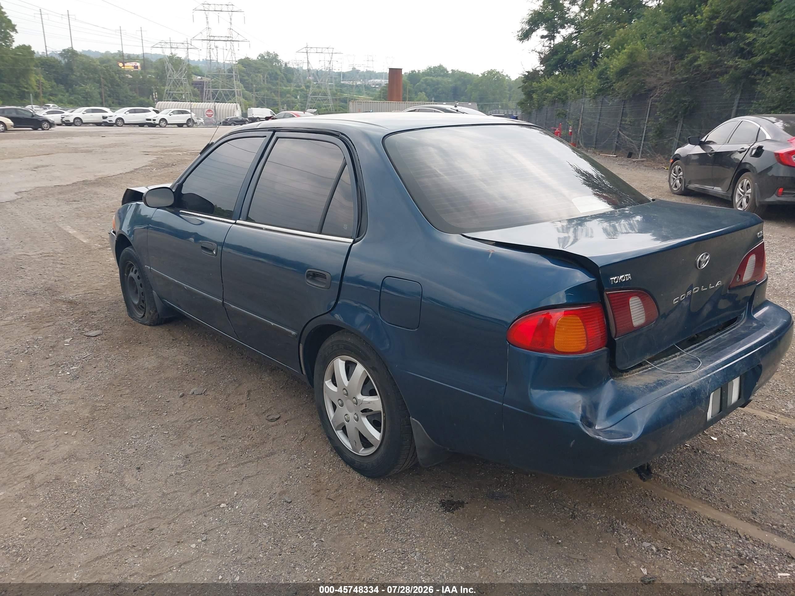 1999 Toyota Corolla Ce Blue vin: 2T1BR12E2XC186816