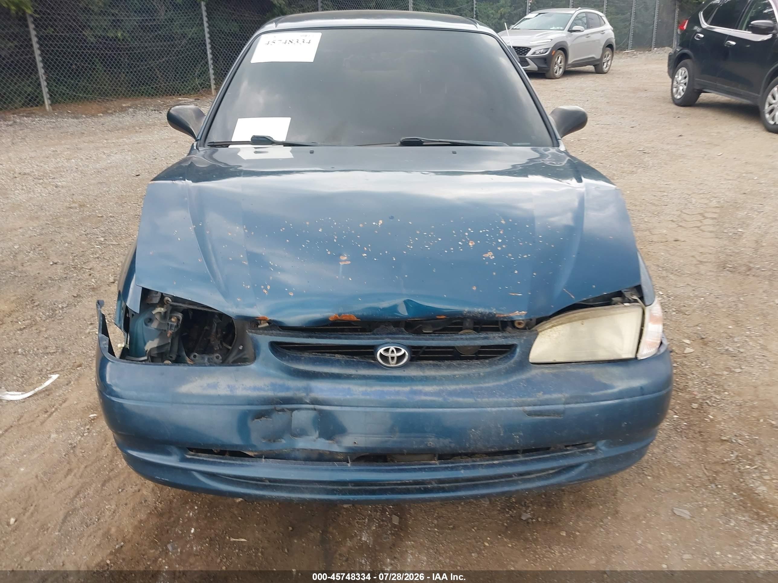 1999 Toyota Corolla Ce Blue vin: 2T1BR12E2XC186816