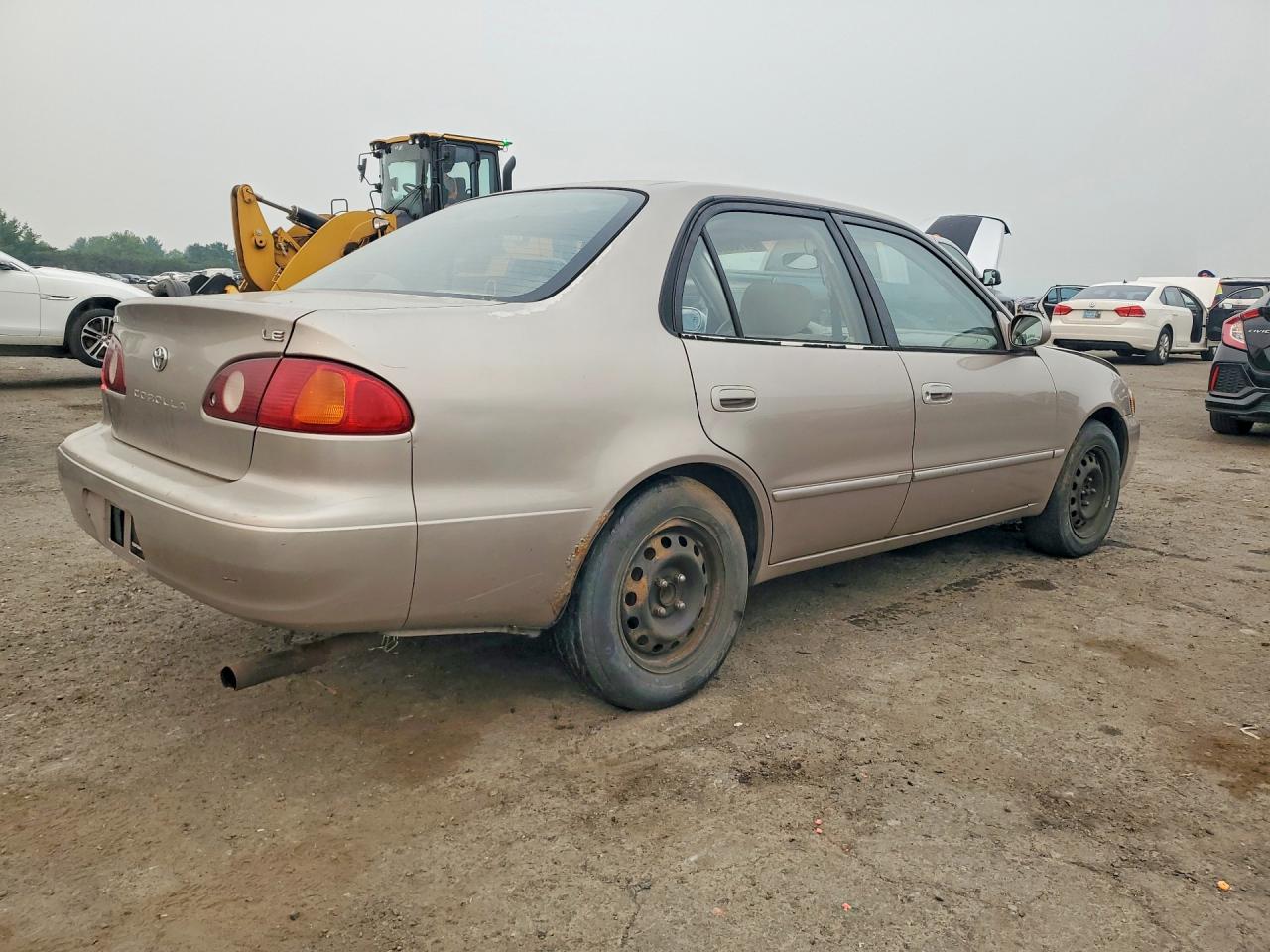 2001 Toyota Corolla Le Желто-коричневый vin: 2T1BR12E31C457535