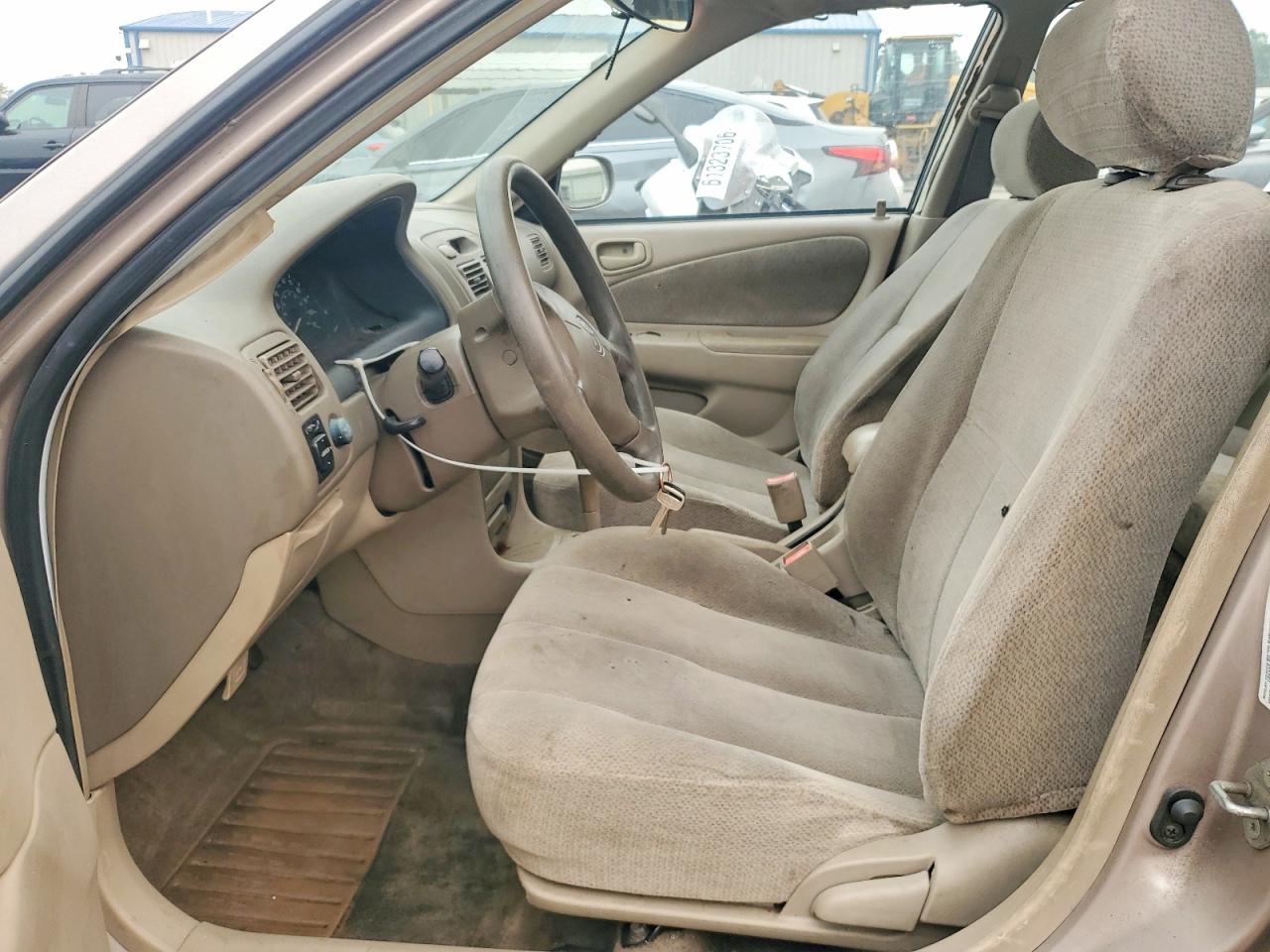 2001 Toyota Corolla Le Желто-коричневый vin: 2T1BR12E31C457535