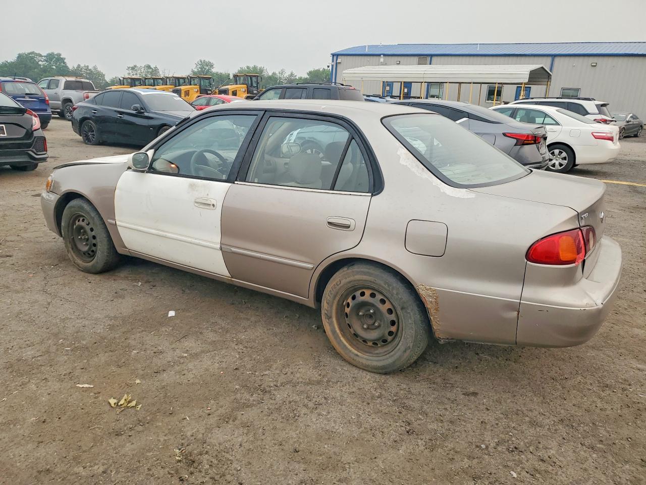 2001 Toyota Corolla Le Желто-коричневый vin: 2T1BR12E31C457535