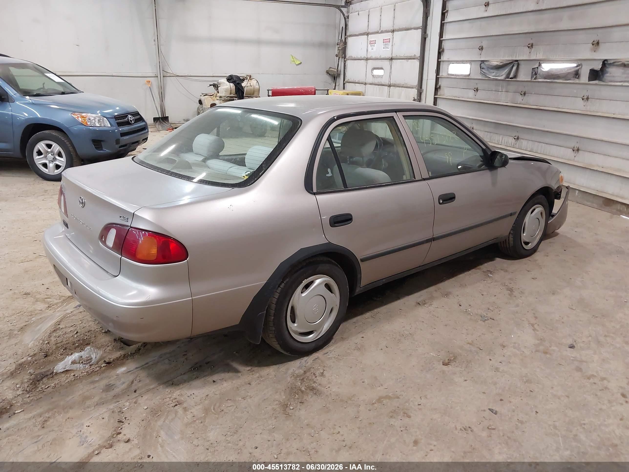 1999 Toyota Corolla Ce Tan vin: 2T1BR12E3XC116371