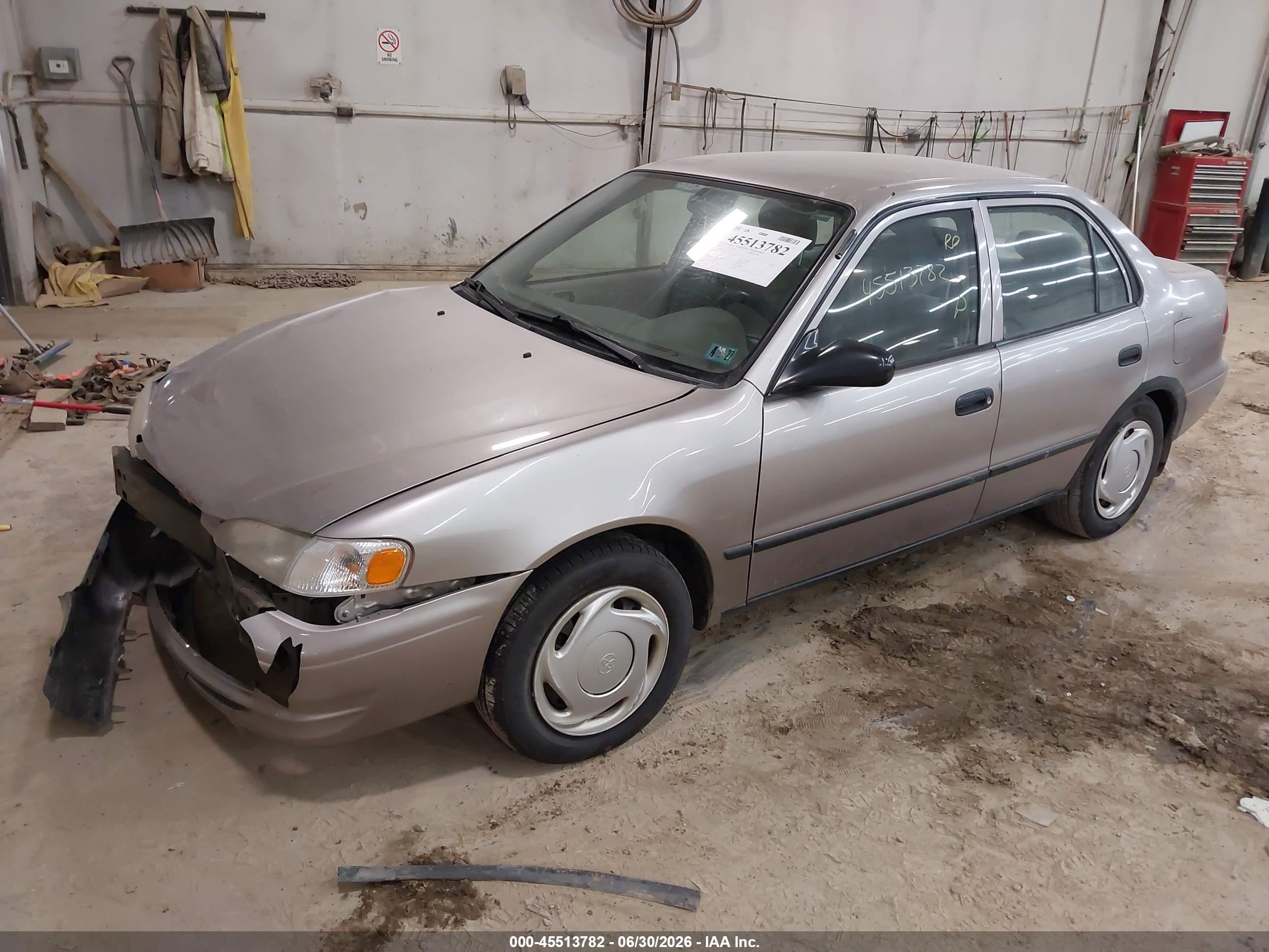 1999 Toyota Corolla Ce Tan vin: 2T1BR12E3XC116371