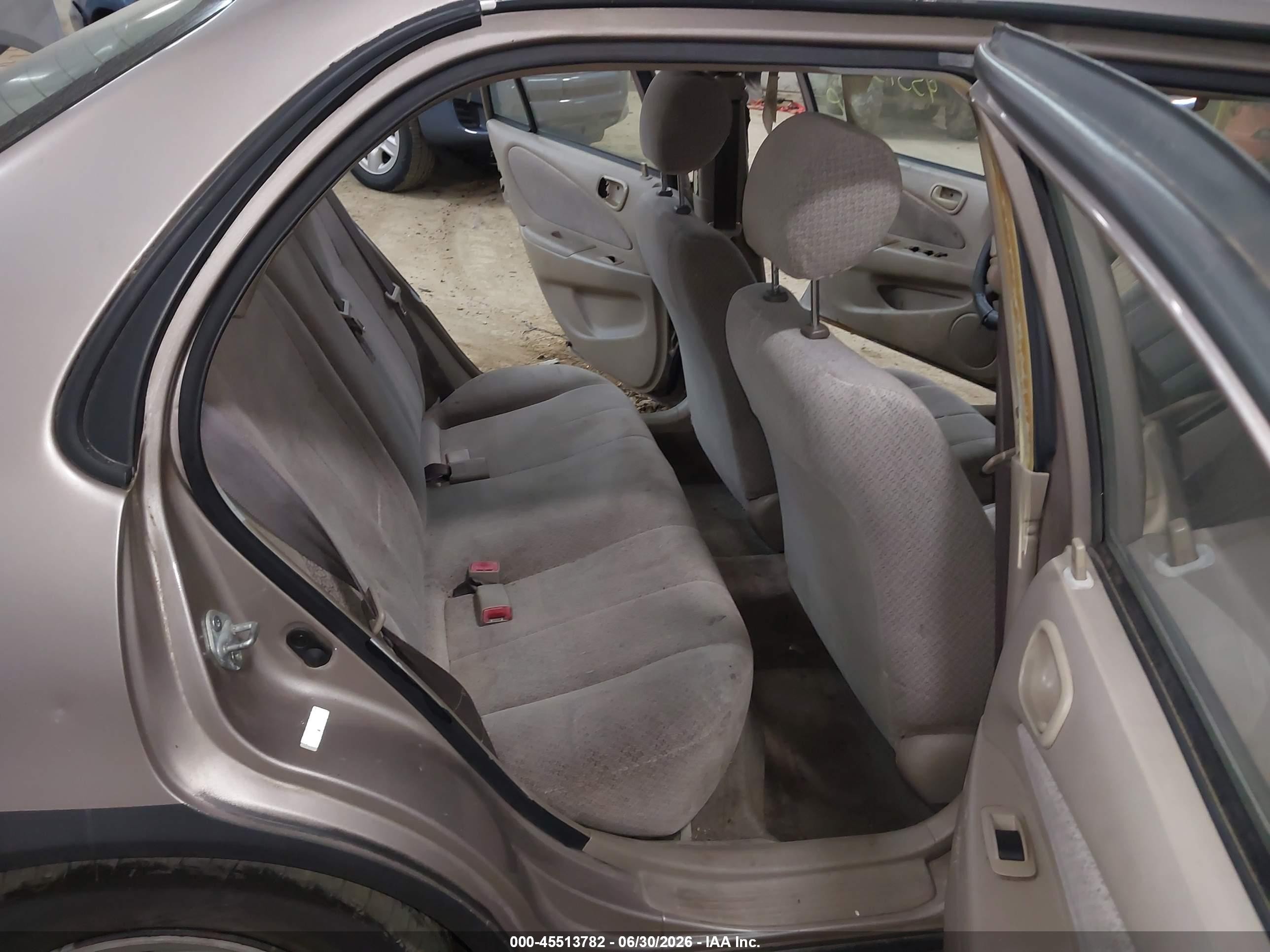 1999 Toyota Corolla Ce Tan vin: 2T1BR12E3XC116371