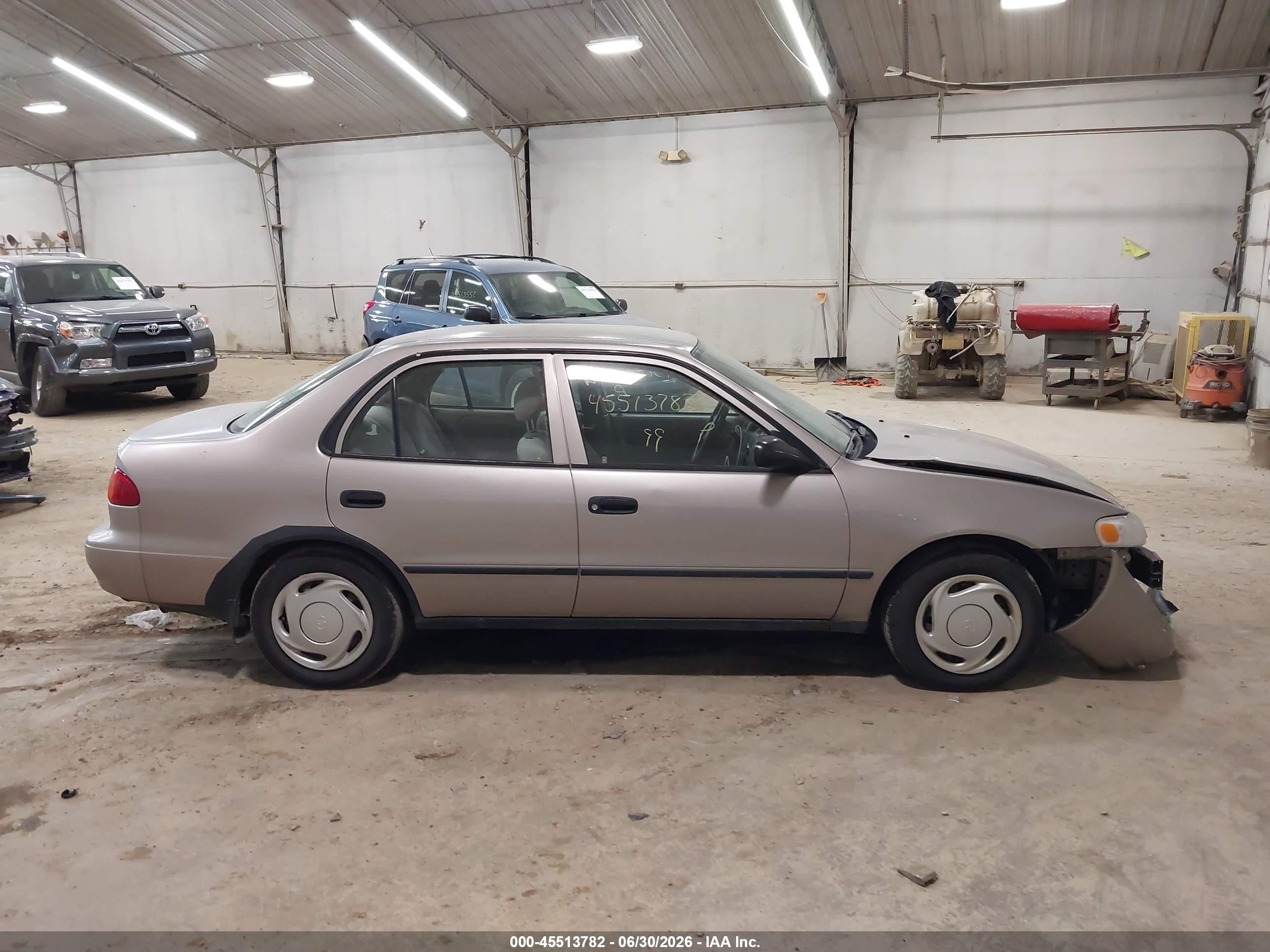 1999 Toyota Corolla Ce Tan vin: 2T1BR12E3XC116371