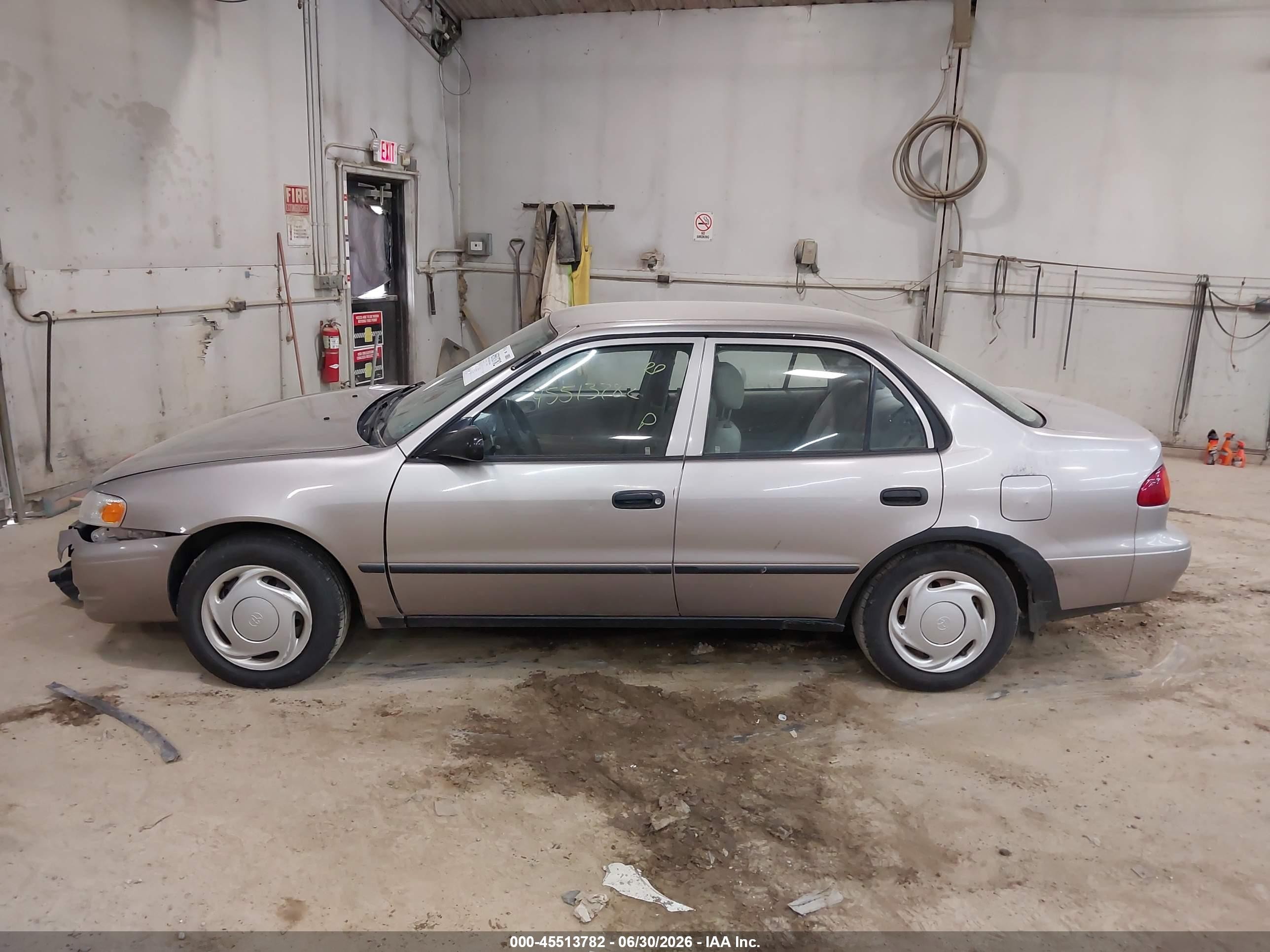 1999 Toyota Corolla Ce Tan vin: 2T1BR12E3XC116371