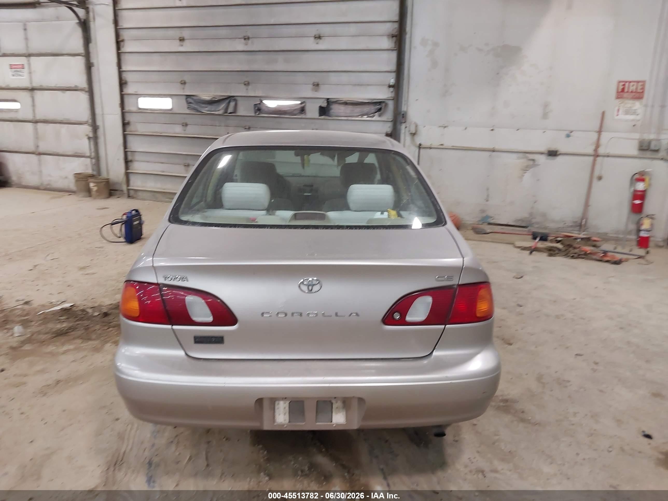 1999 Toyota Corolla Ce Tan vin: 2T1BR12E3XC116371