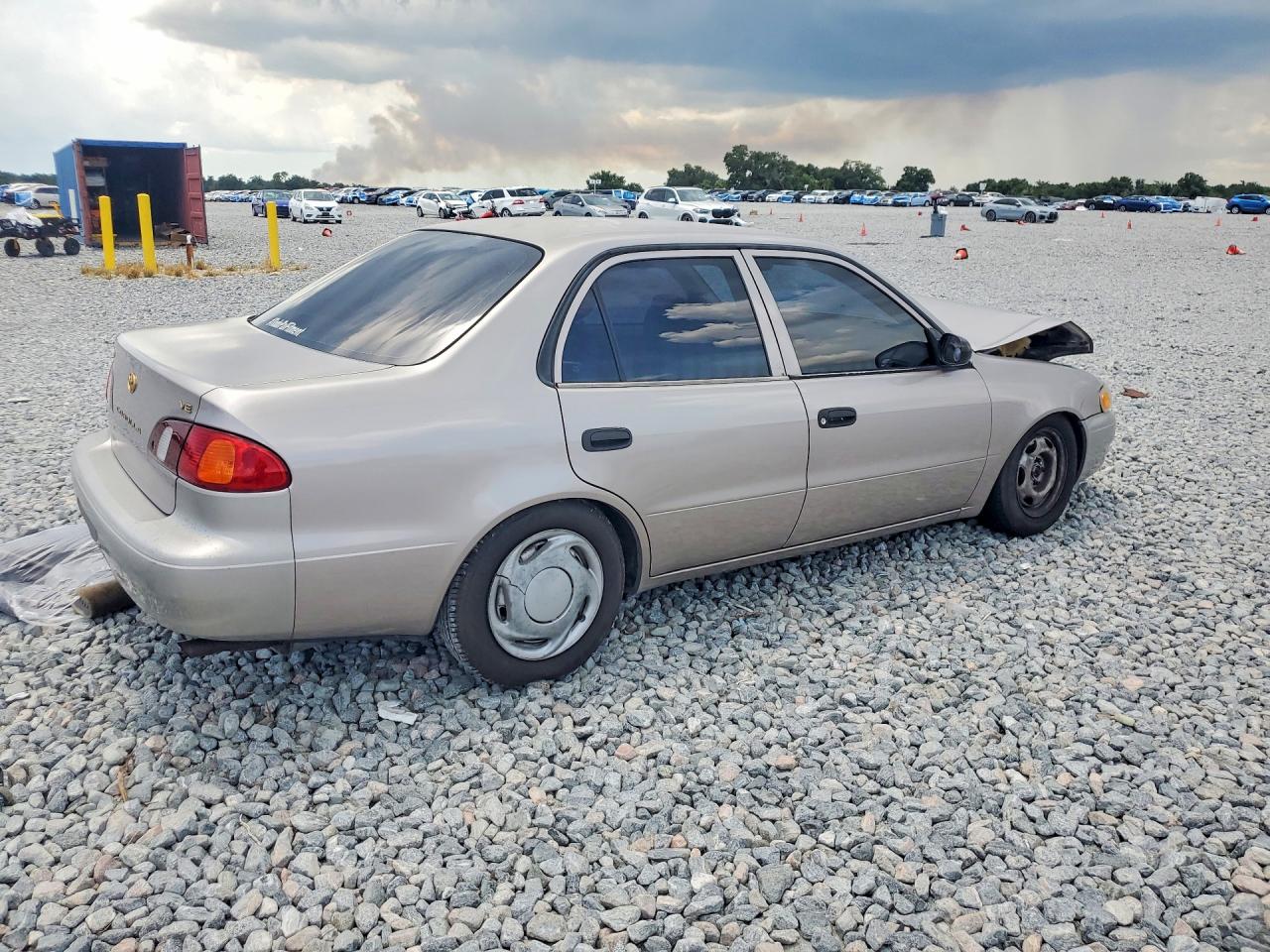 2000 Toyota Corolla Ve Tan vin: 2T1BR12E3YC321349