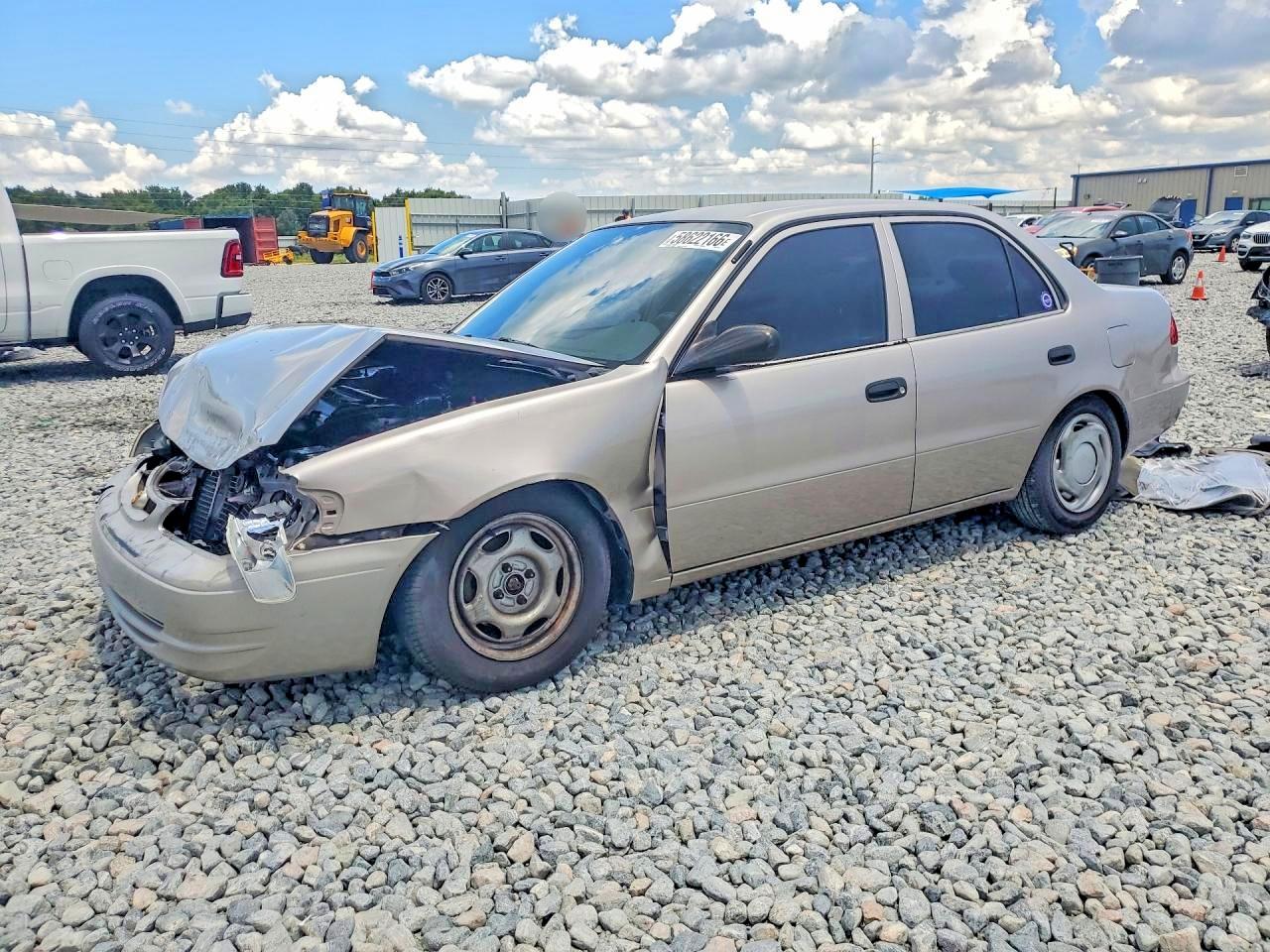 2000 Toyota Corolla Ve Tan vin: 2T1BR12E3YC321349