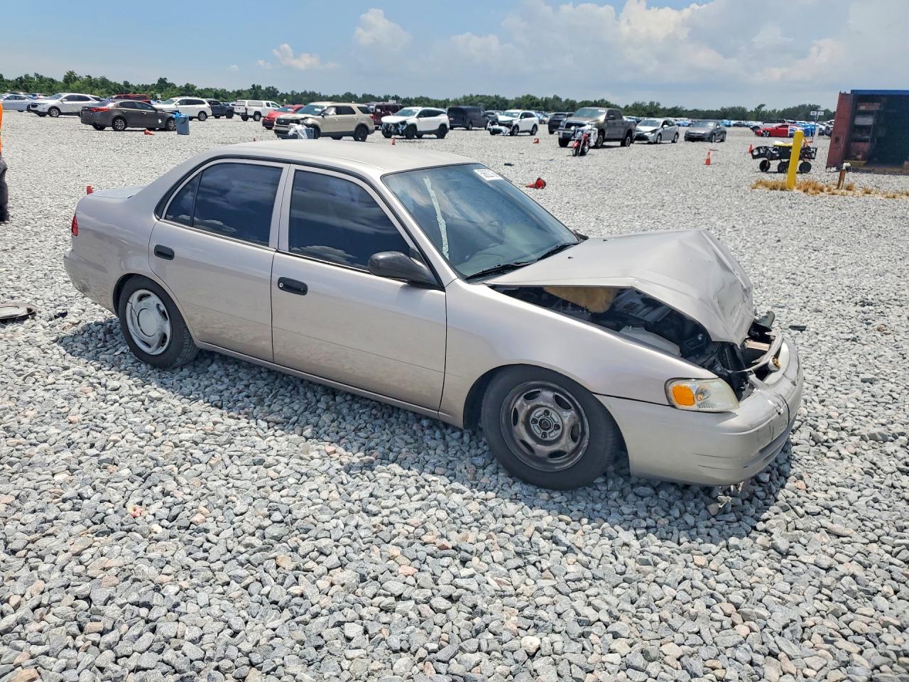 2000 Toyota Corolla Ve Tan vin: 2T1BR12E3YC321349