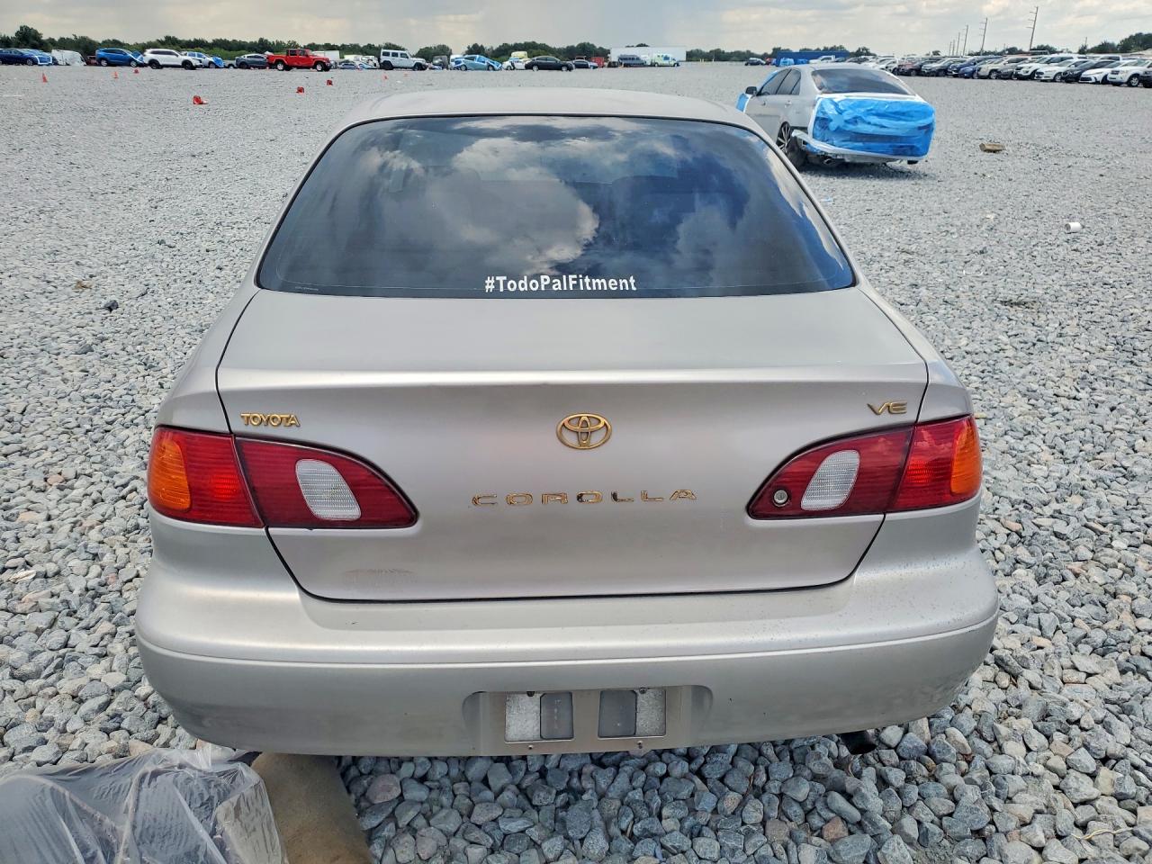 2000 Toyota Corolla Ve Tan vin: 2T1BR12E3YC321349