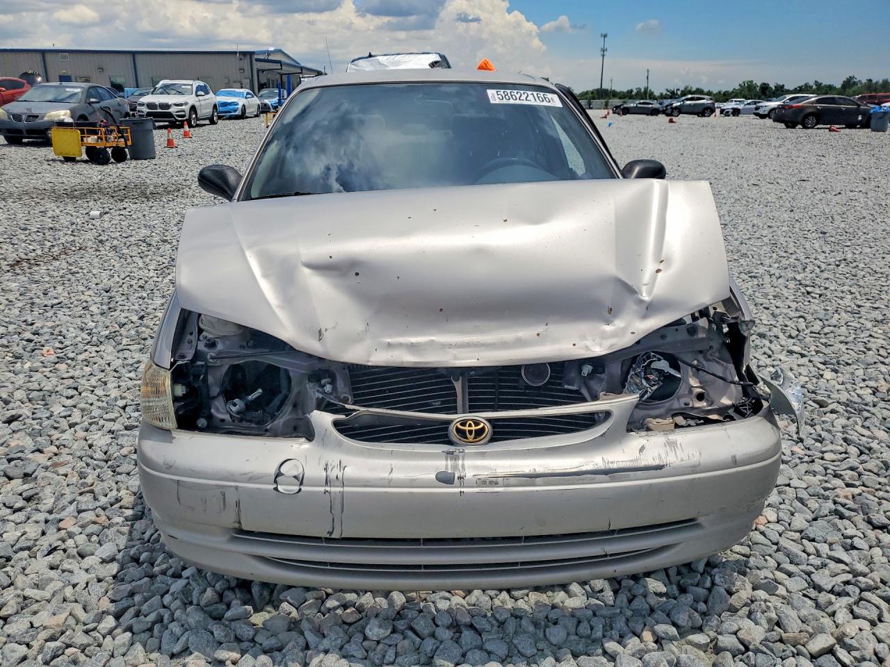 2000 Toyota Corolla Ve Tan vin: 2T1BR12E3YC321349
