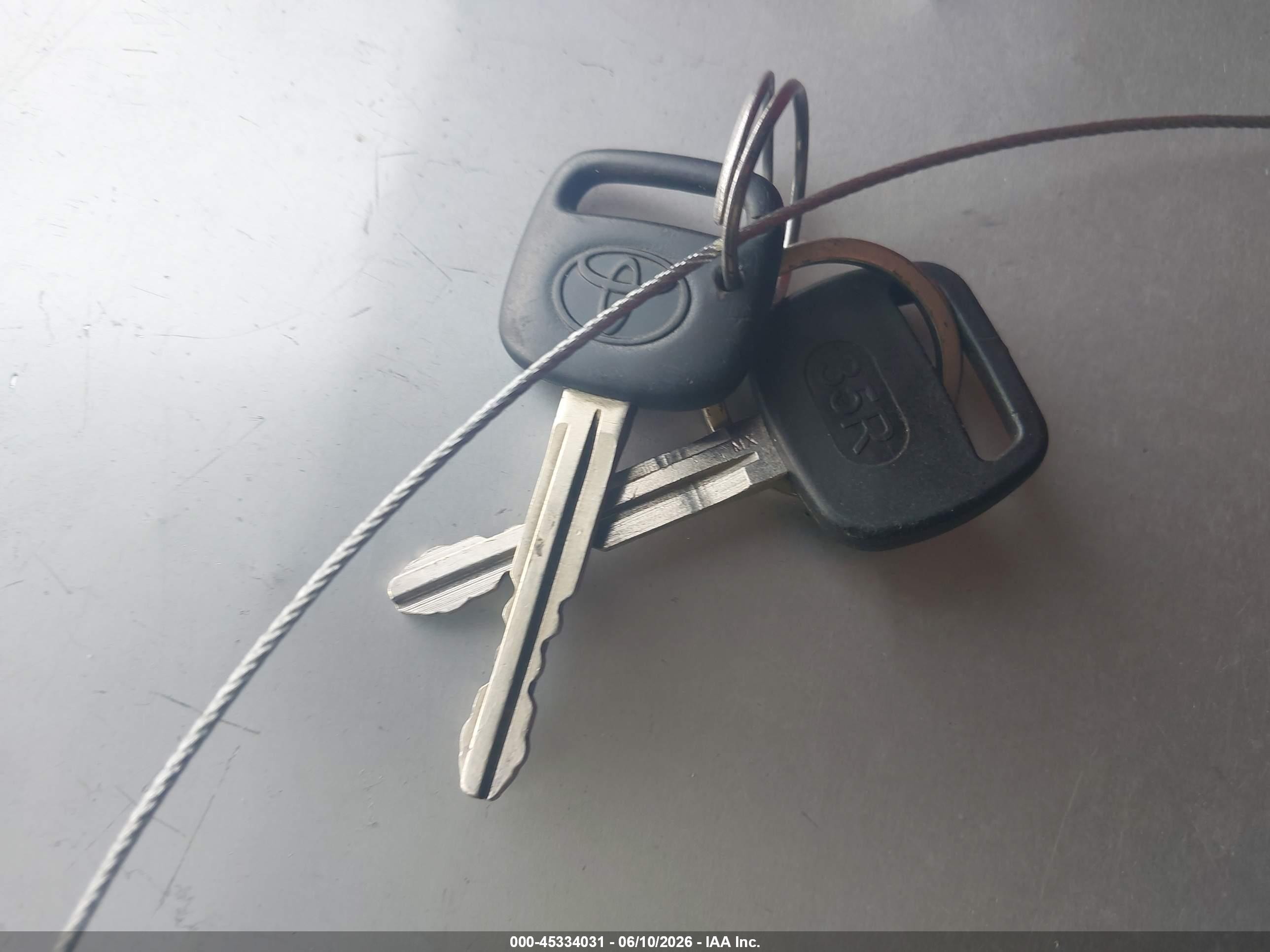 2002 Toyota Corolla Le Maroon vin: 2T1BR12E42C570265