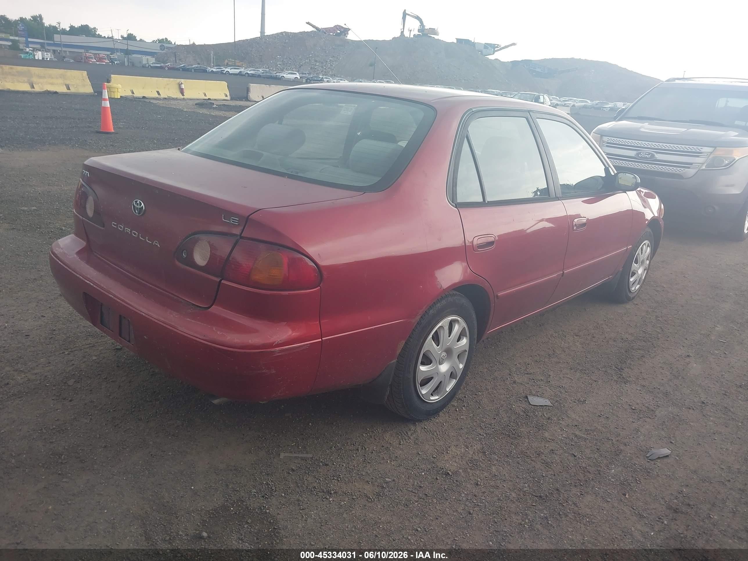 2002 Toyota Corolla Le Maroon vin: 2T1BR12E42C570265