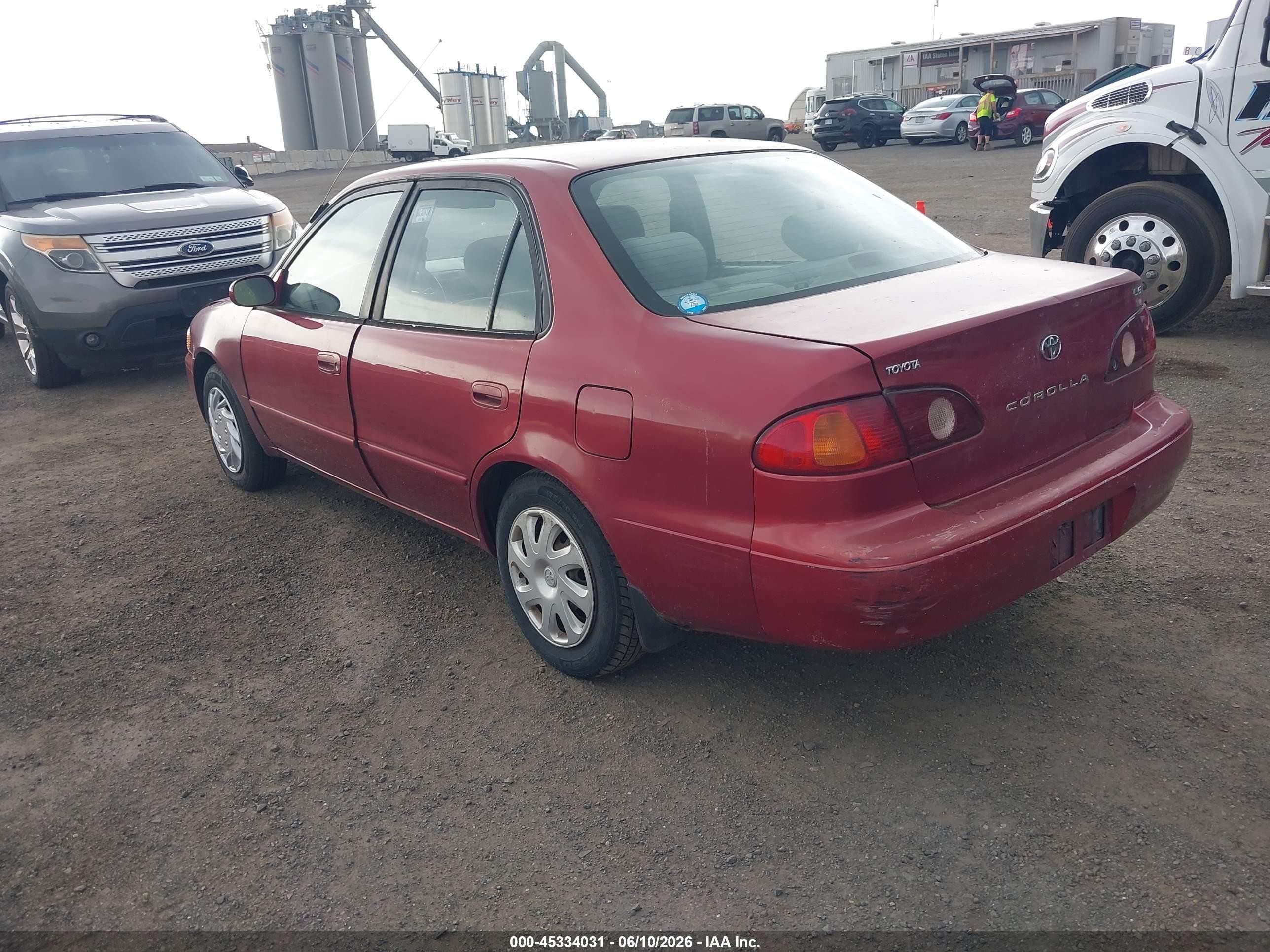 2002 Toyota Corolla Le Maroon vin: 2T1BR12E42C570265