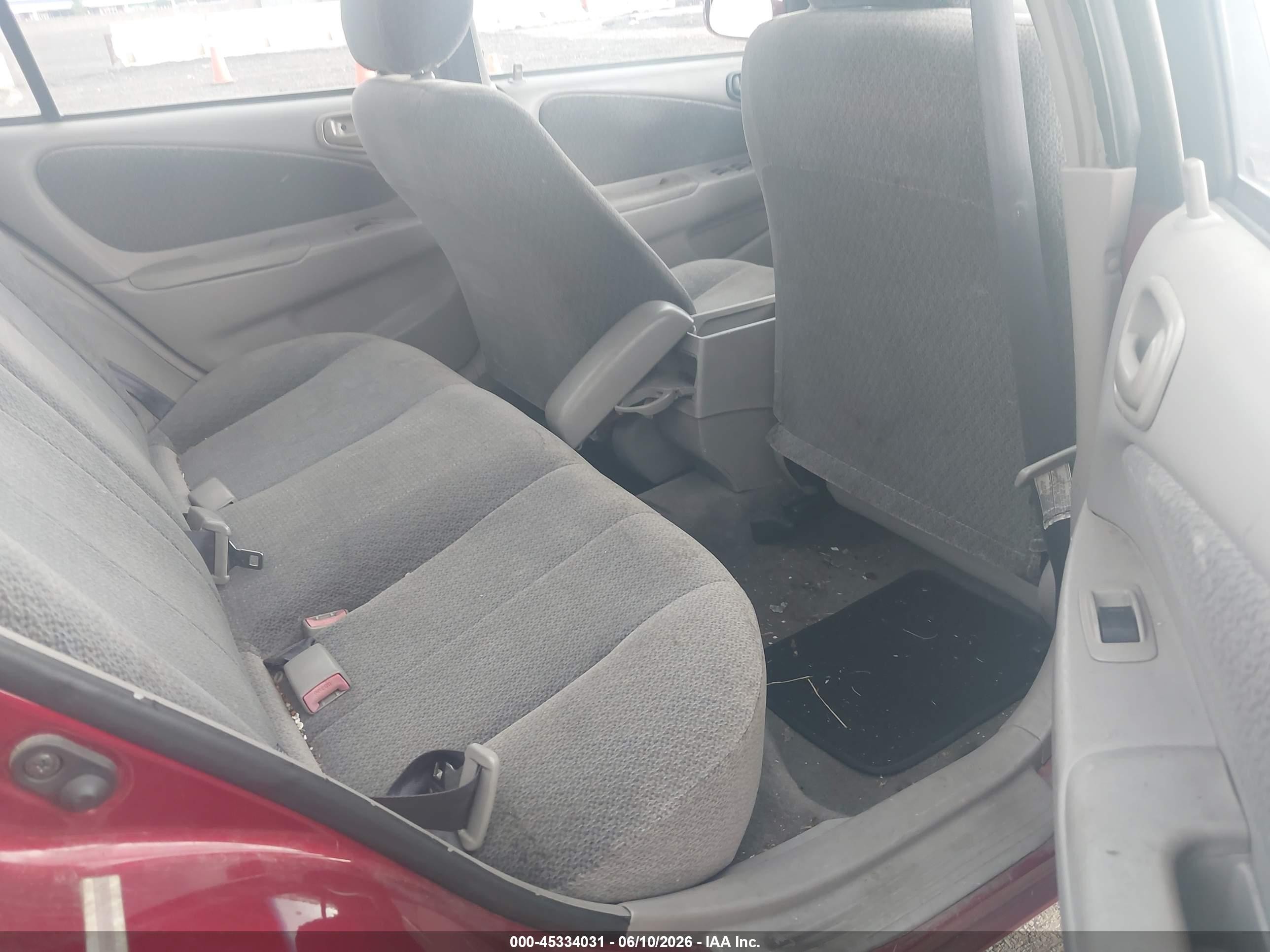 2002 Toyota Corolla Le Maroon vin: 2T1BR12E42C570265
