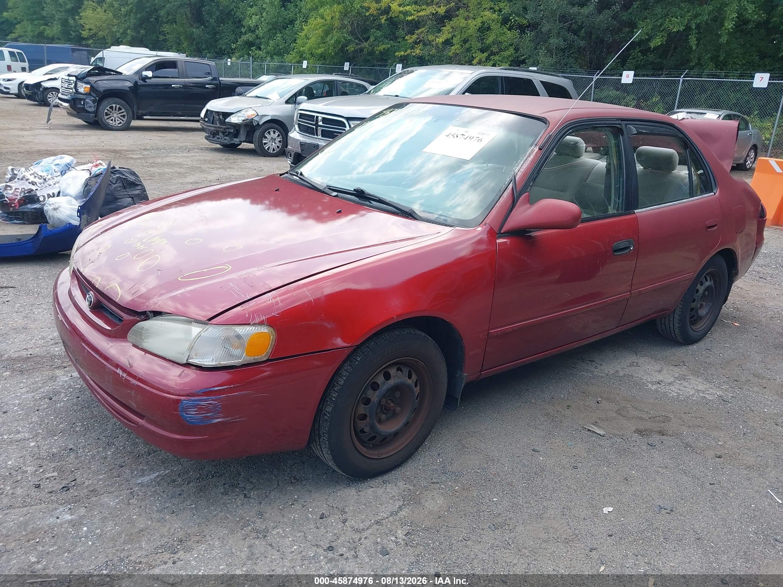 2001 Toyota Corolla Le Красный vin: 2T1BR12E51C468276